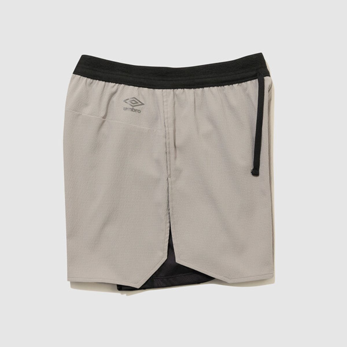 엄브로(UMBRO) 슬로우킥 경량 레깅스 투인원(2IN1) 3부 반바지 베이지 UR221SHP54