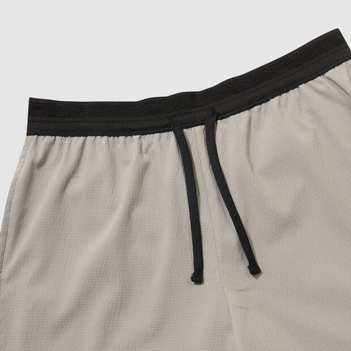 엄브로(UMBRO) 슬로우킥 경량 레깅스 투인원(2IN1) 3부 반바지 베이지 UR221SHP54