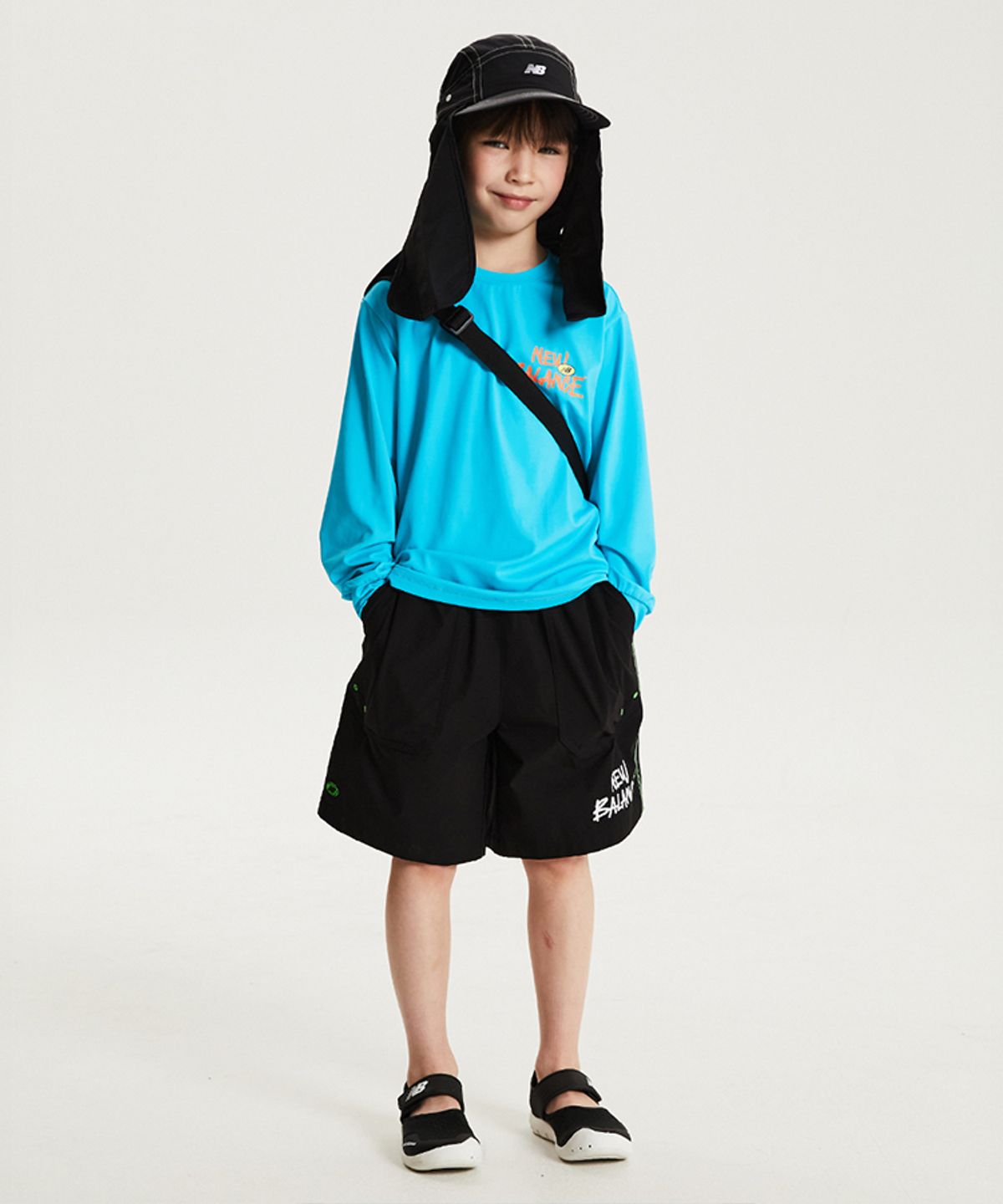 뉴발란스 키즈(NEWBALANCEKIDS) Spotlight Hot Summer_아동 로고 포인트 긴팔 래쉬가드 티셔츠 NK9RG3973U50