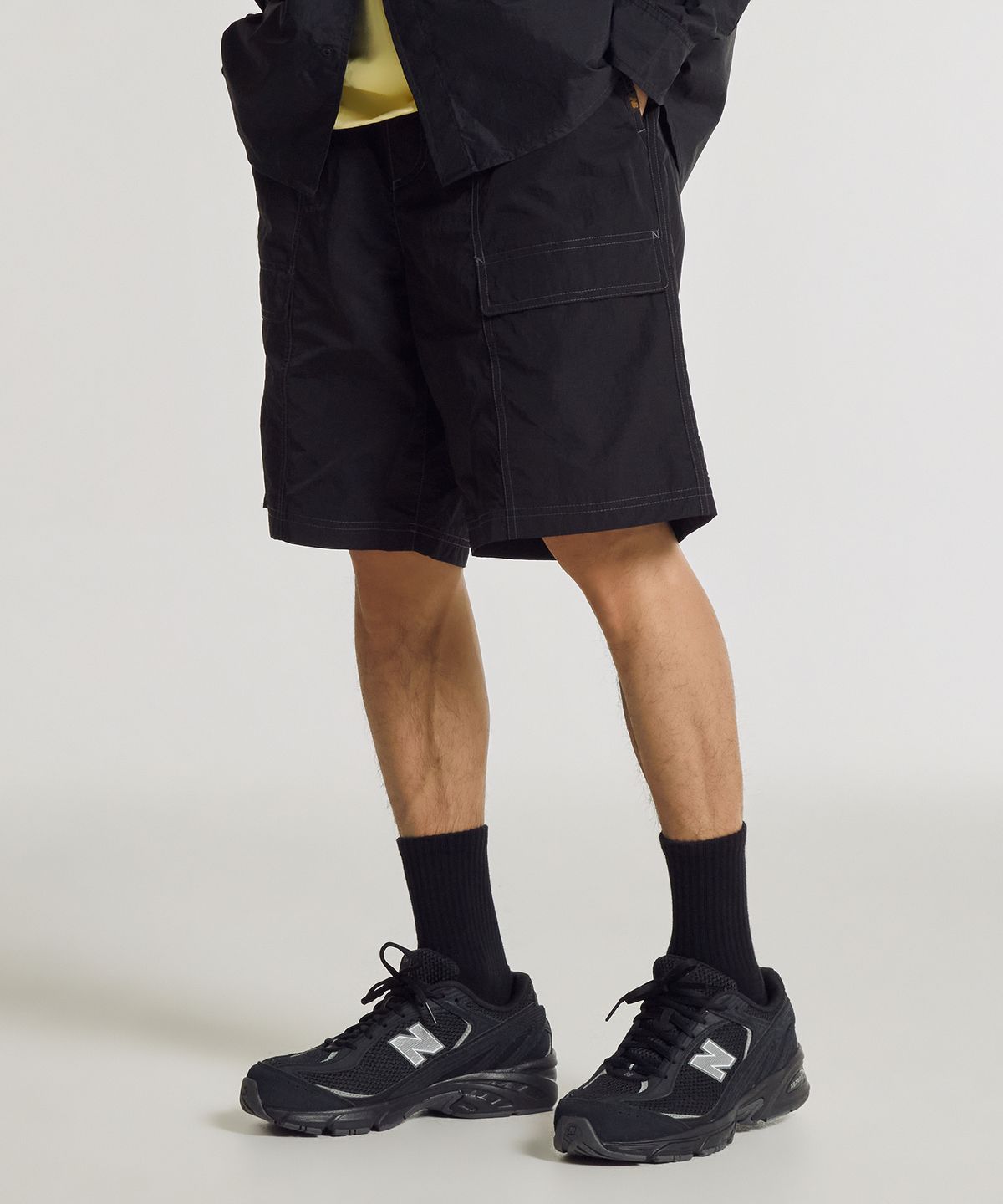 뉴발란스(NEW BALANCE) NBNVG31623 / UNI 써니 레이니 카고 5부 쇼츠 (BLACK)