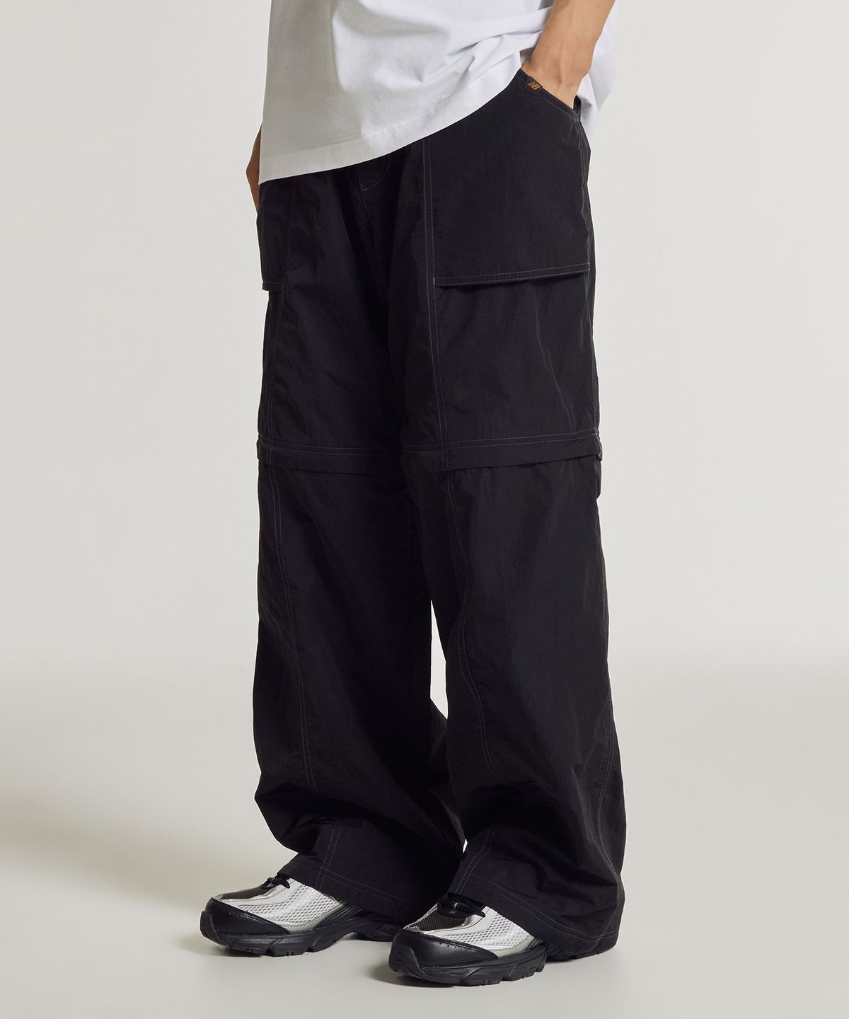 뉴발란스(NEW BALANCE) NBNTG31623 / UNI 써니 레이니 디테쳐블 팬츠 (BLACK)
