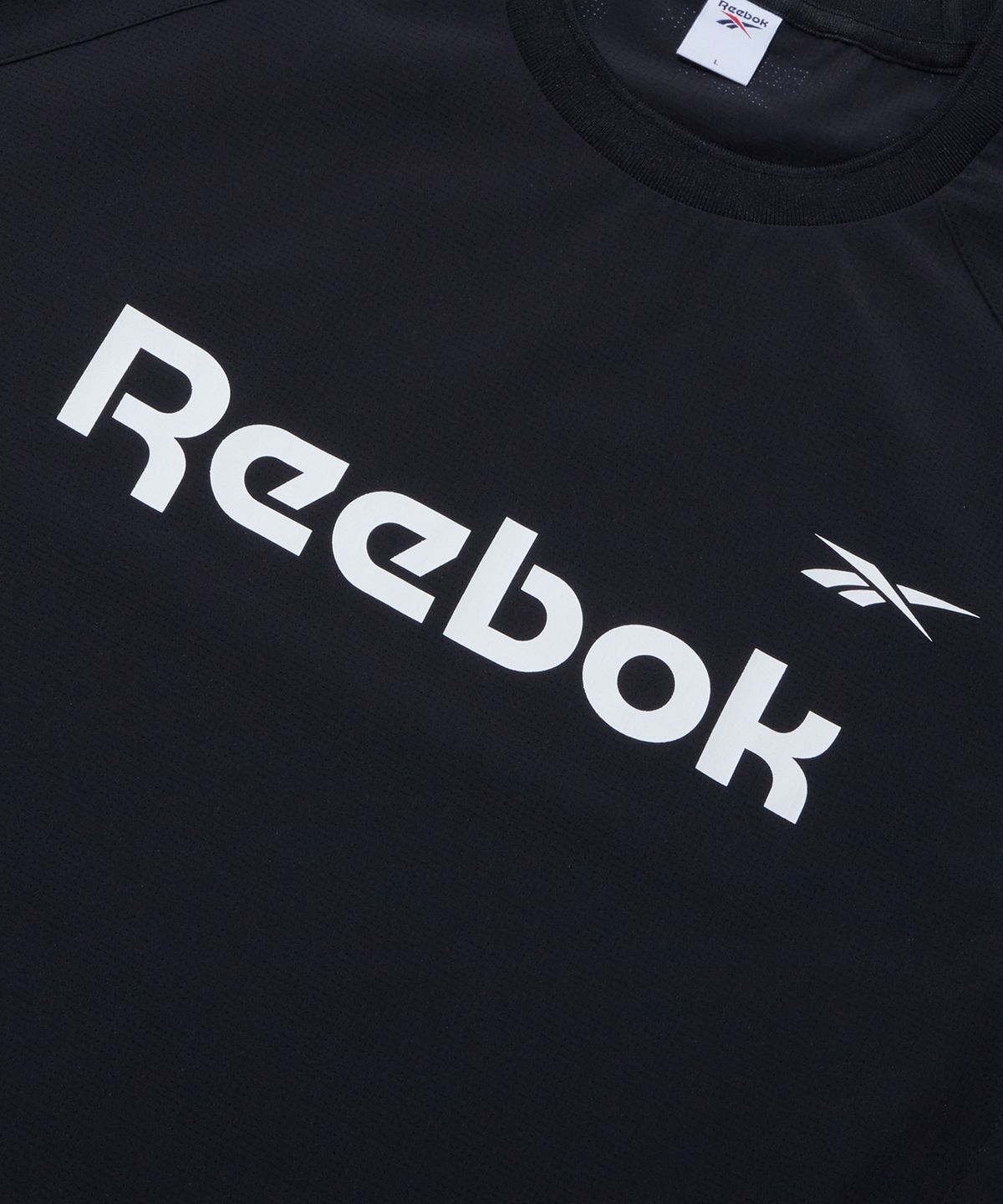 리복(REEBOK) 레터링 에어닷 반팔티 - 블랙