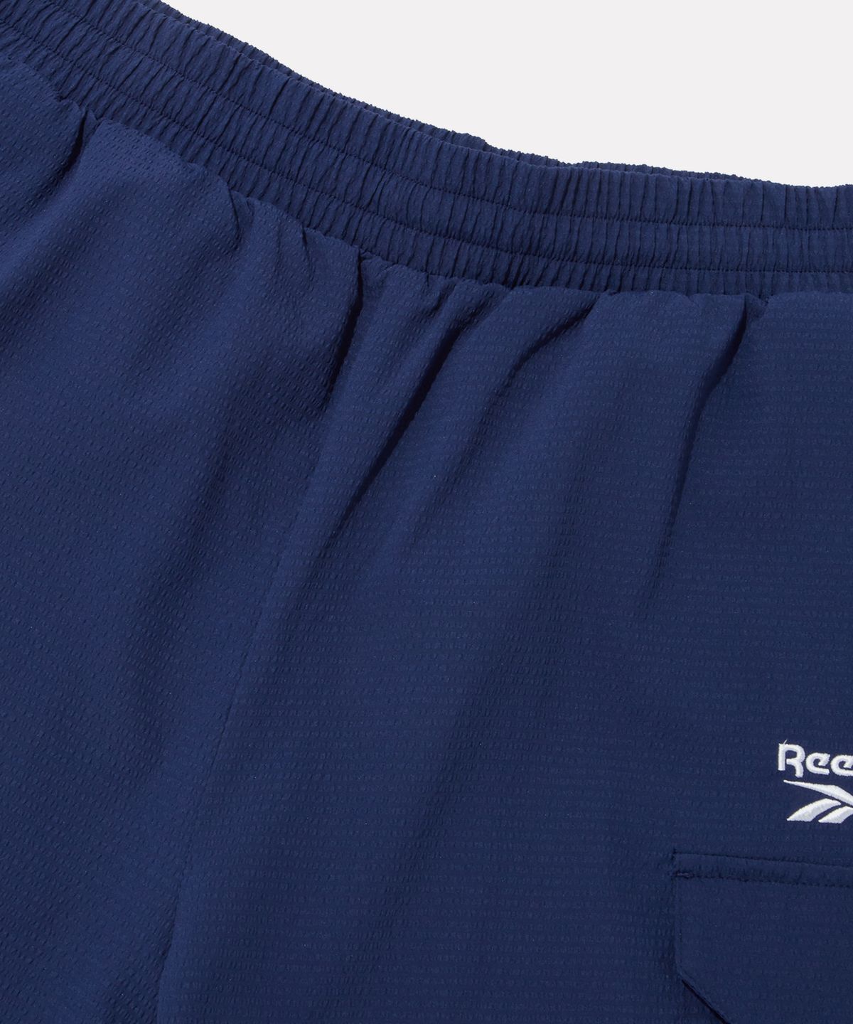 리복(REEBOK) 시어서커 카고 쇼츠 - 네이비
