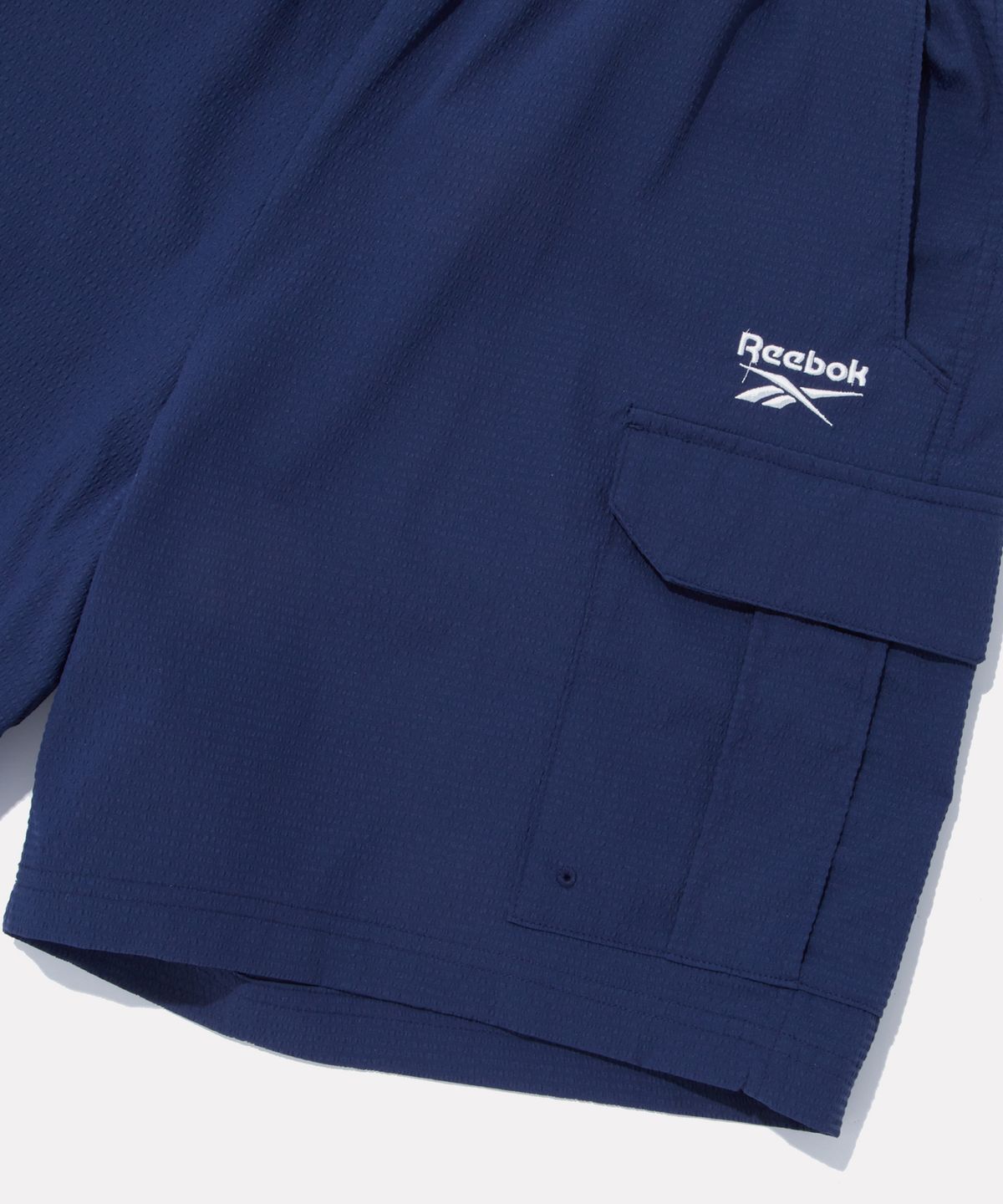 리복(REEBOK) 시어서커 카고 쇼츠 - 네이비