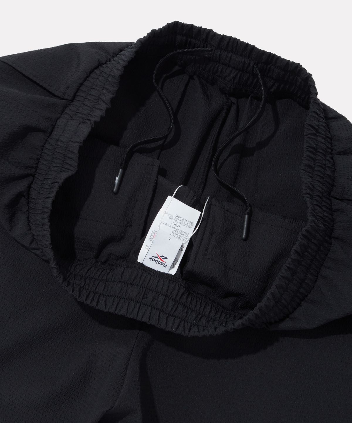 리복(REEBOK) 시어서커 카고 쇼츠 - 블랙