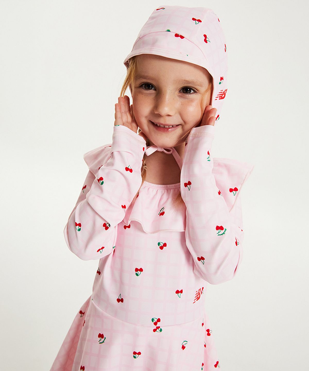 뉴발란스 키즈(NEWBALANCEKIDS) NBgC Cherry Blossom_패턴 원피스 래쉬가드 아동 수영복 NK9RG3773G25