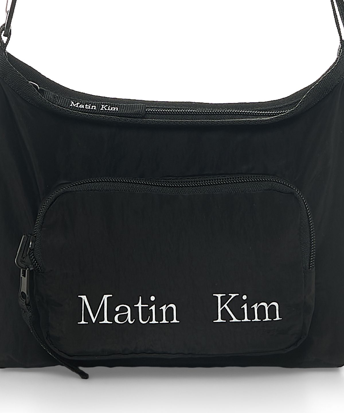 마뗑킴(MATIN KIM) PACKABLE CROSS POCKET BAG IN BLACK
