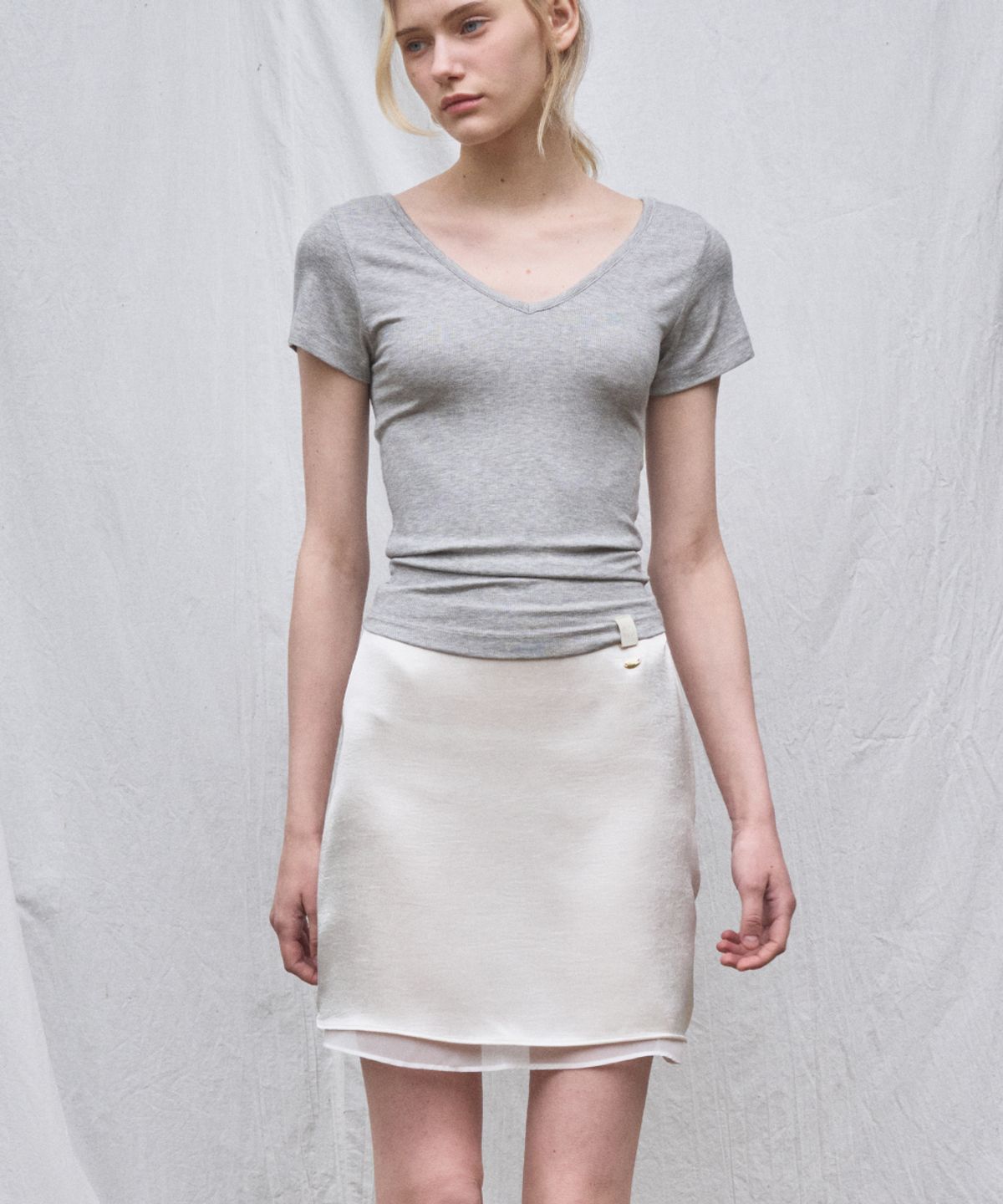 헤인트(HAINT) MIST DOUBLE LAYERED SATIN MINI SKIRT 3COL_IVORY