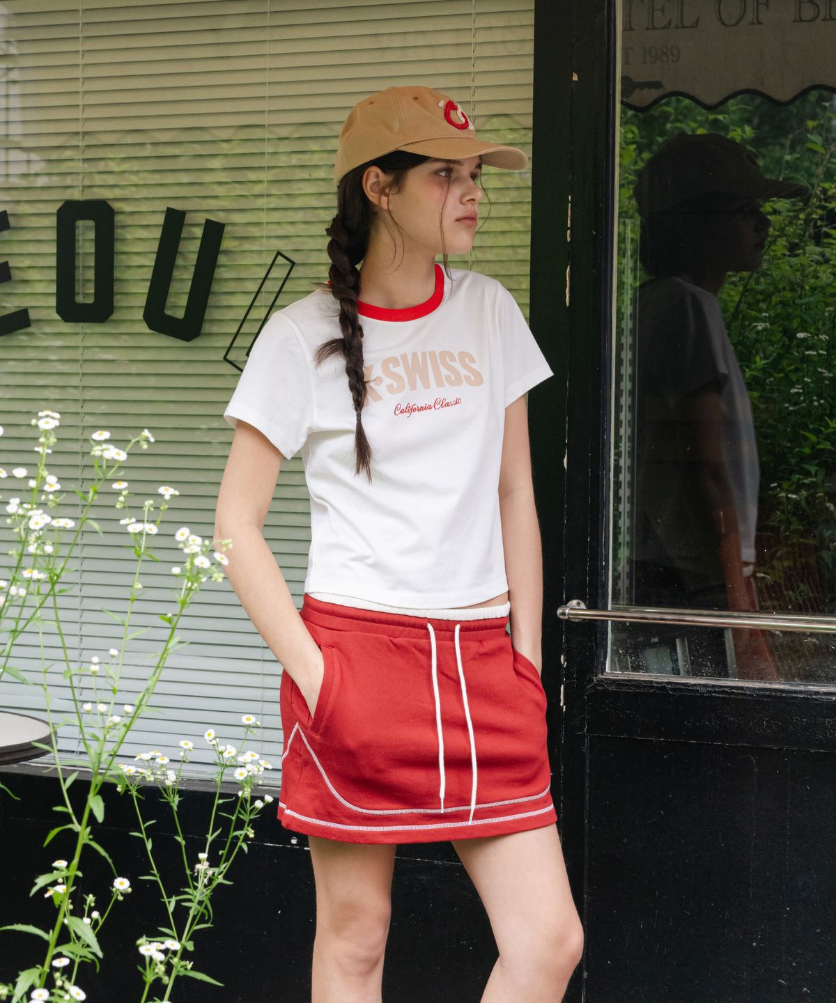 케이스위스(K-SWISS) 여성 60th 로고 크롭 티_1KSTSMV509WH