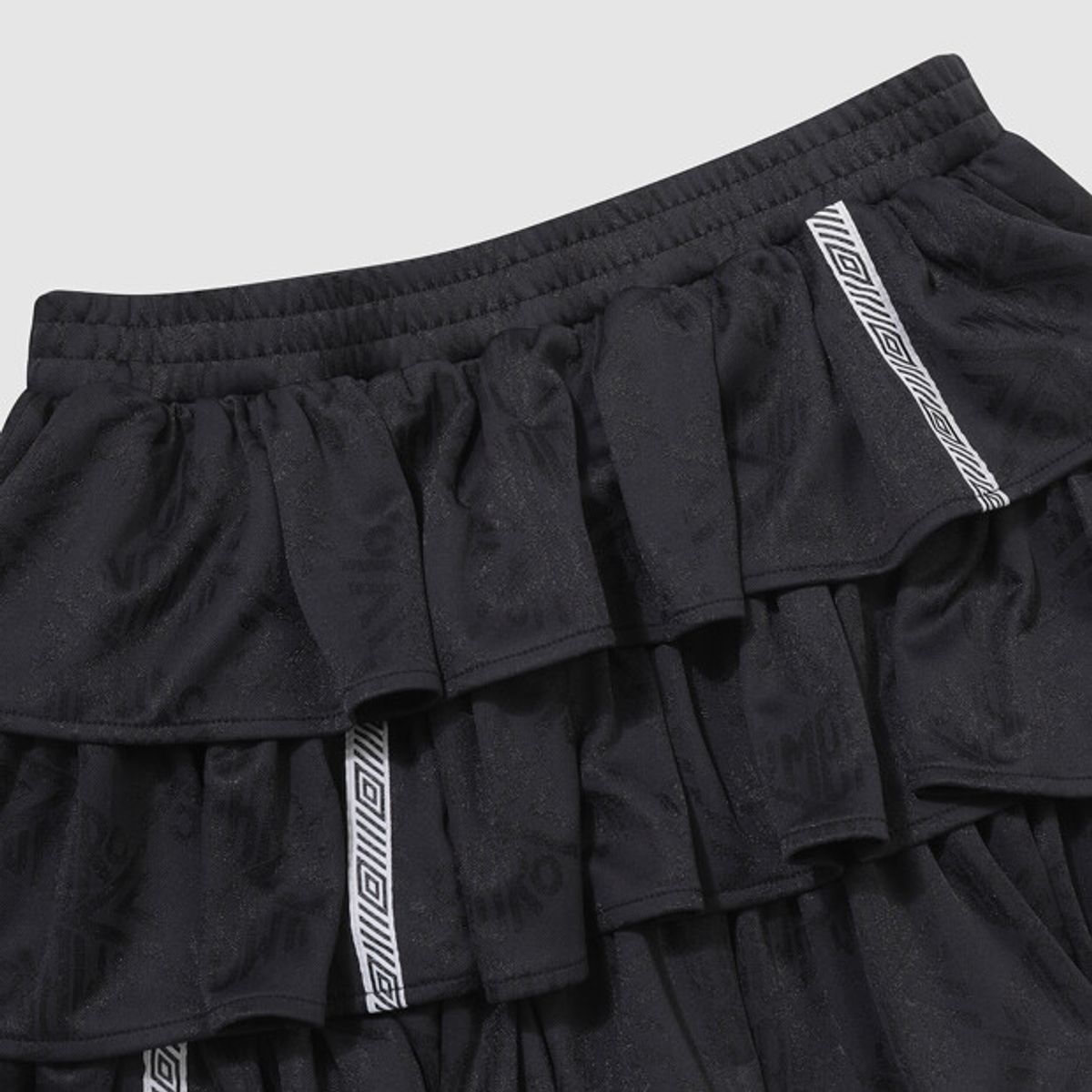 엄브로(UMBRO) HBL 우먼스 자카드 티어드 스커트 블랙 UR222CSK51