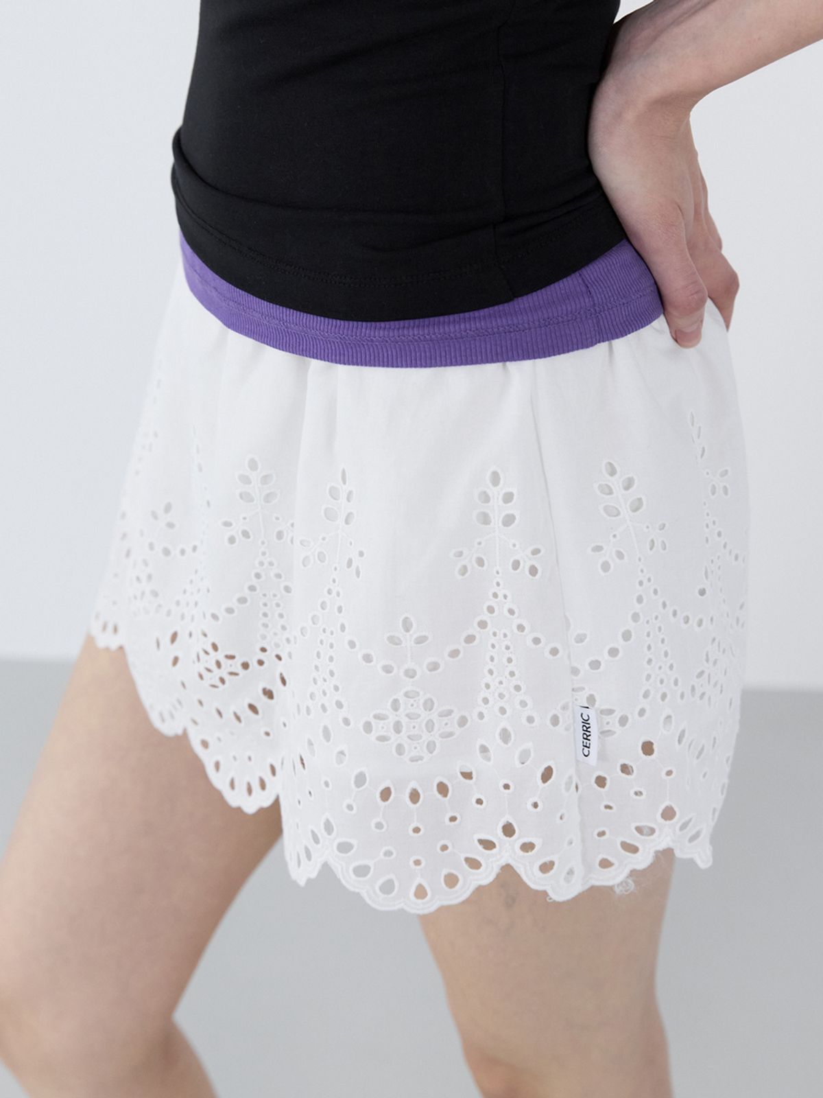 세릭(CERRIC) Eyelet Mini Skirt _ White
