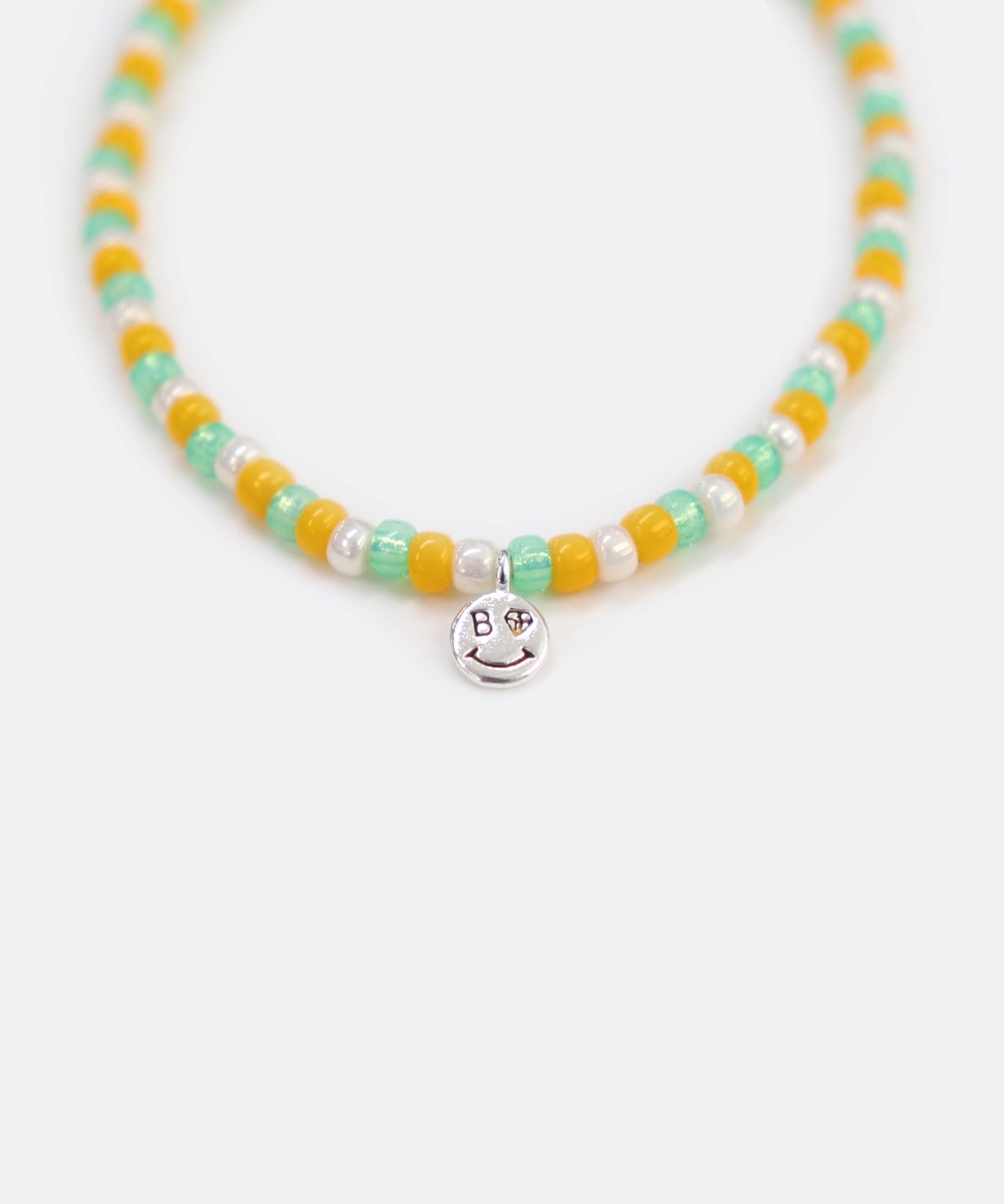 봉보(BONBEAU) Luce color beads layered Bracelet 루체 컬러 믹스 비즈 스마일 참 팔찌