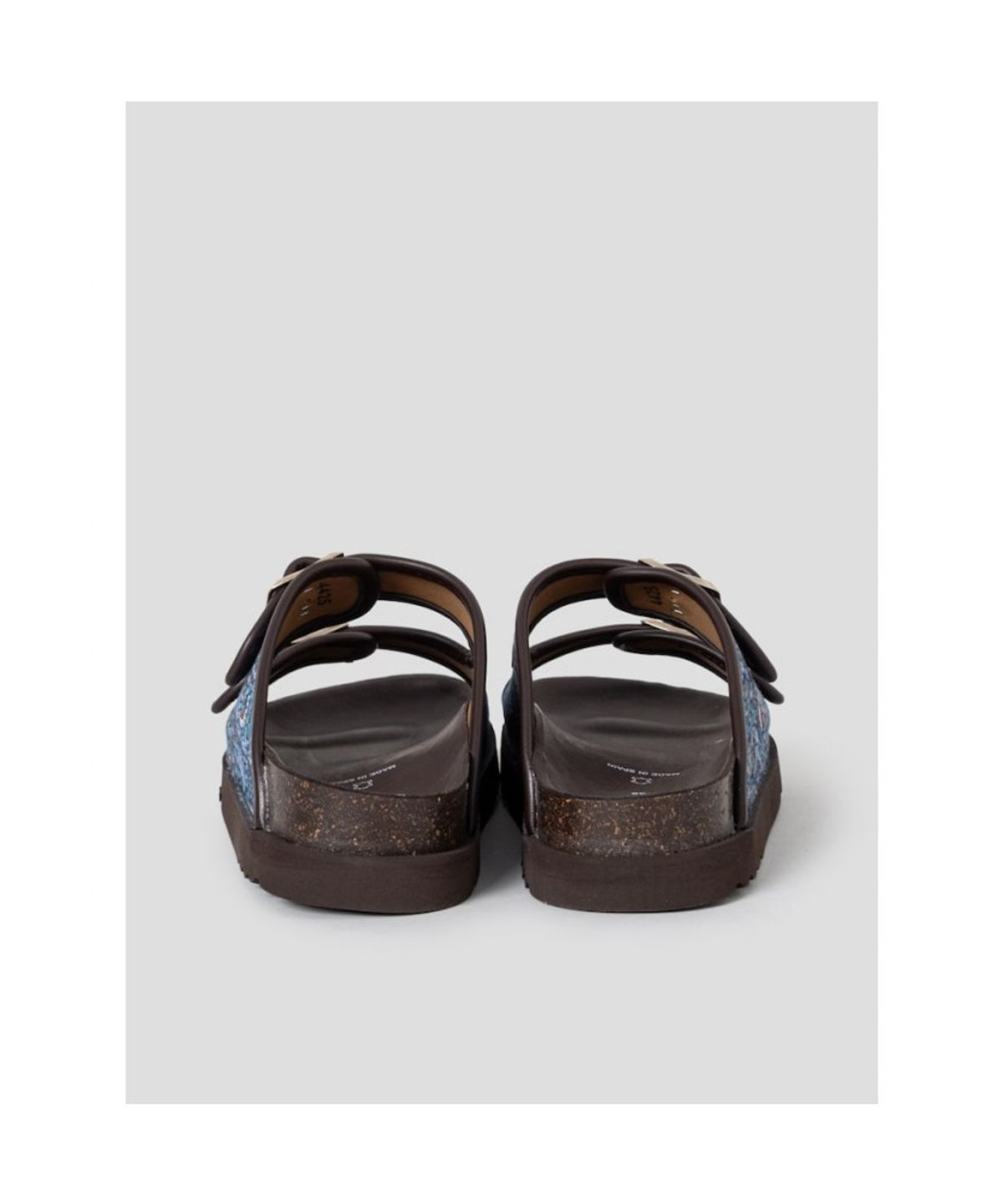 숄(SCHOLL) (WOMEN) 투스트랩 패턴 코르크 샌들  브라운 (HH64K2C17D)