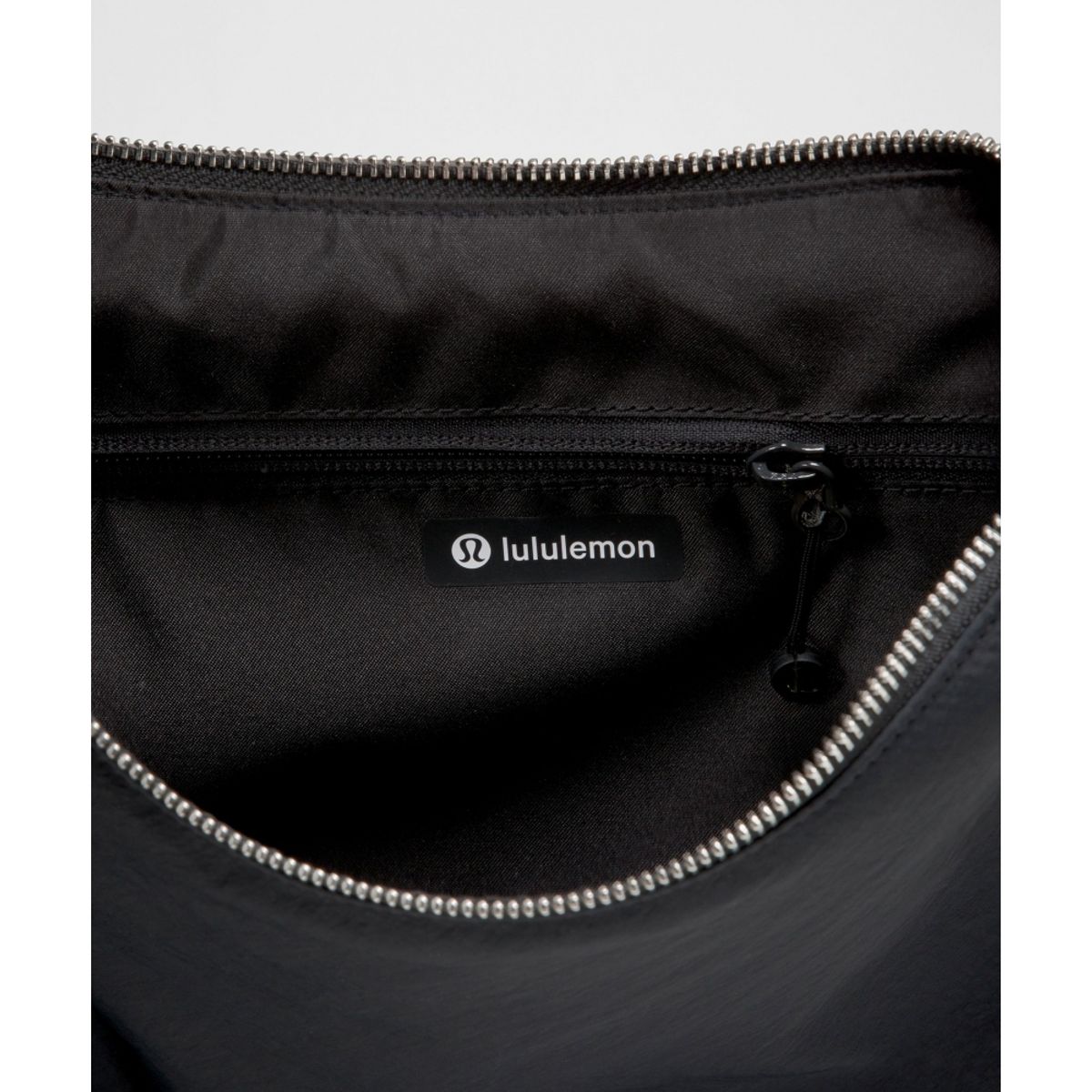 룰루레몬(LULULEMON) 컨버터블 루시드 크로스바디 백 6.5L  BLK ASGY SLVR