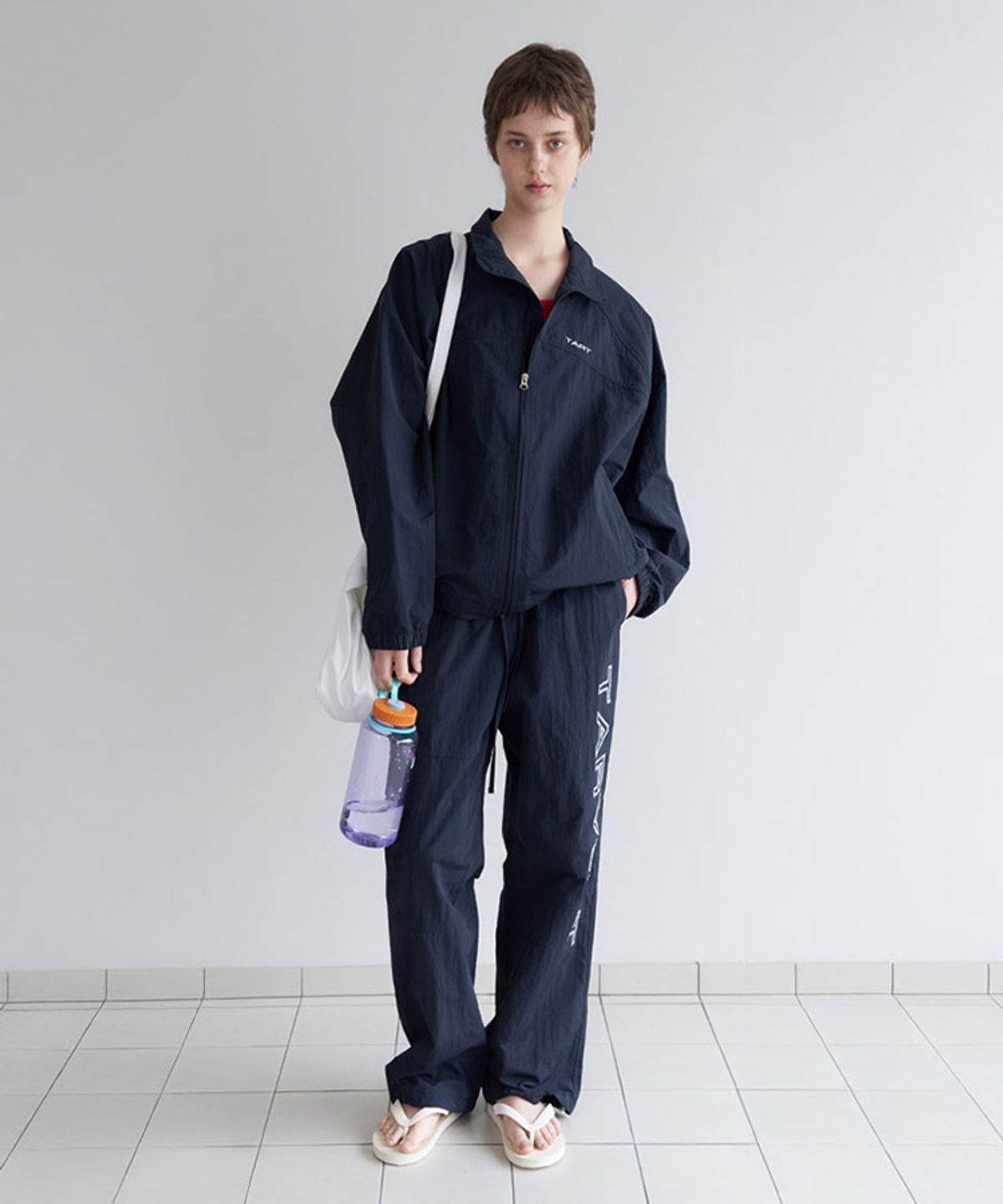 타버트(TARVERT) Aero Embroidery Nylon Pants - Deep Navy