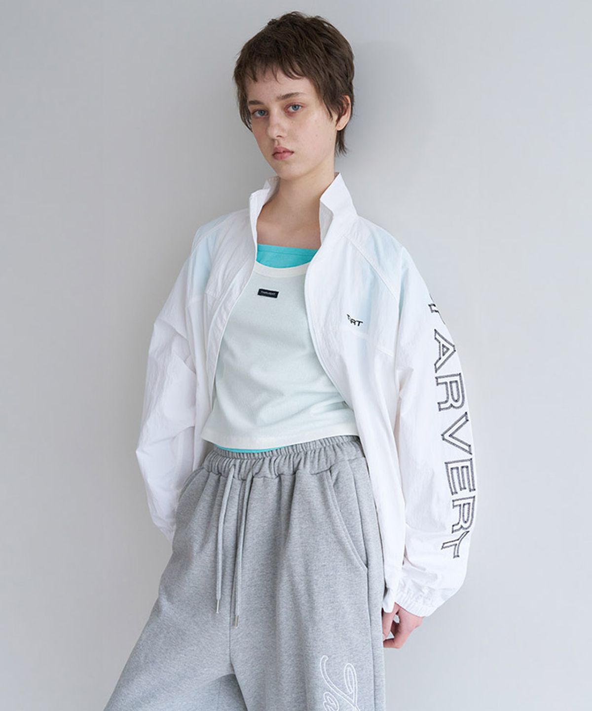 타버트(TARVERT) Aero Embroidery Nylon Wind Jumper - White