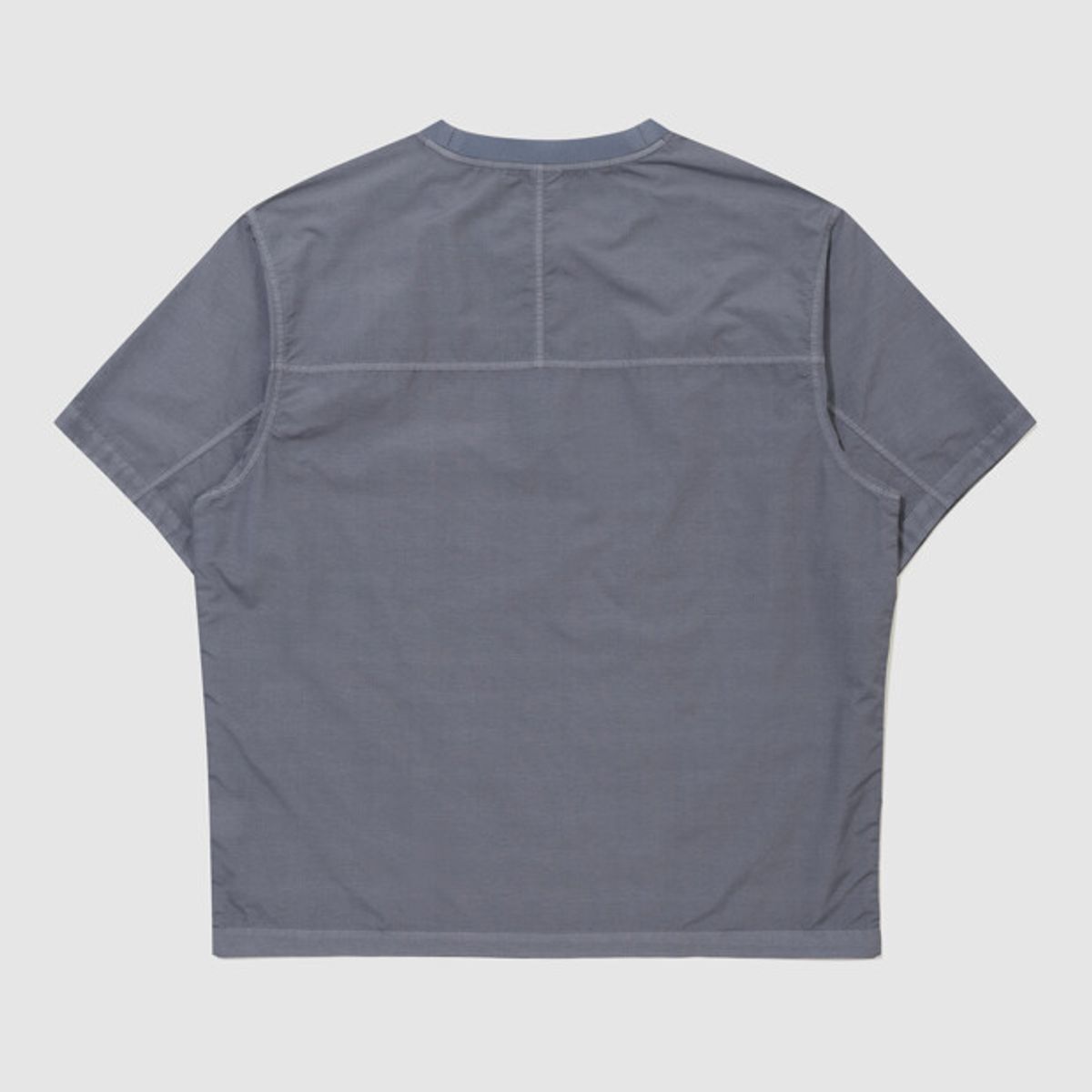 엄브로(UMBRO) 콘크리트 블룸 다잉 우븐 반팔 피스테 블루 UR221CWT55