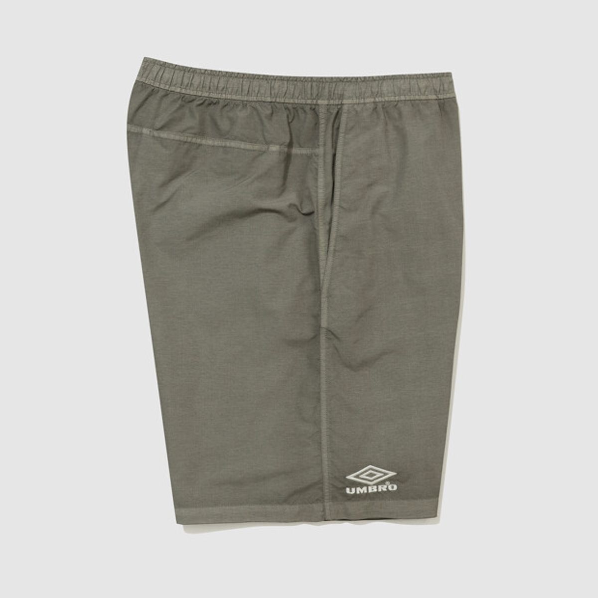 엄브로(UMBRO) 콘크리트 블룸 다잉 우븐 5부 반바지 카키 UR221CHP57