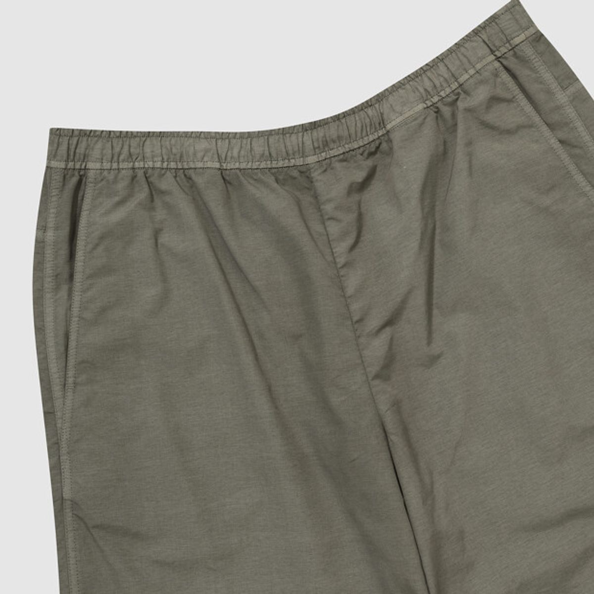 엄브로(UMBRO) 콘크리트 블룸 다잉 우븐 5부 반바지 카키 UR221CHP57
