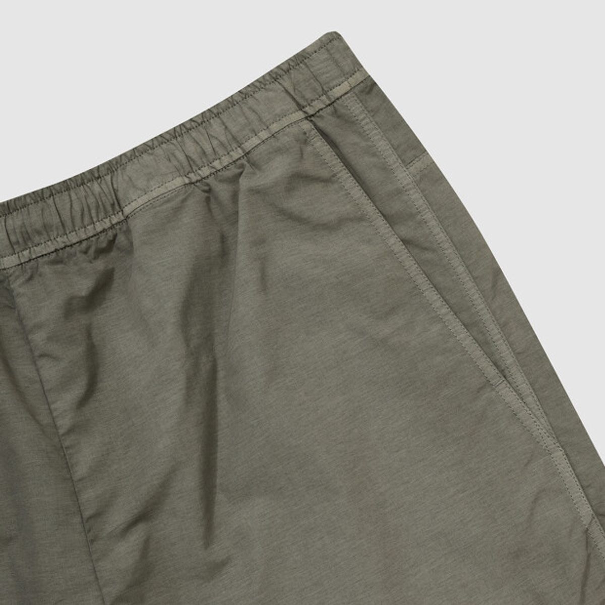 엄브로(UMBRO) 콘크리트 블룸 다잉 우븐 5부 반바지 카키 UR221CHP57