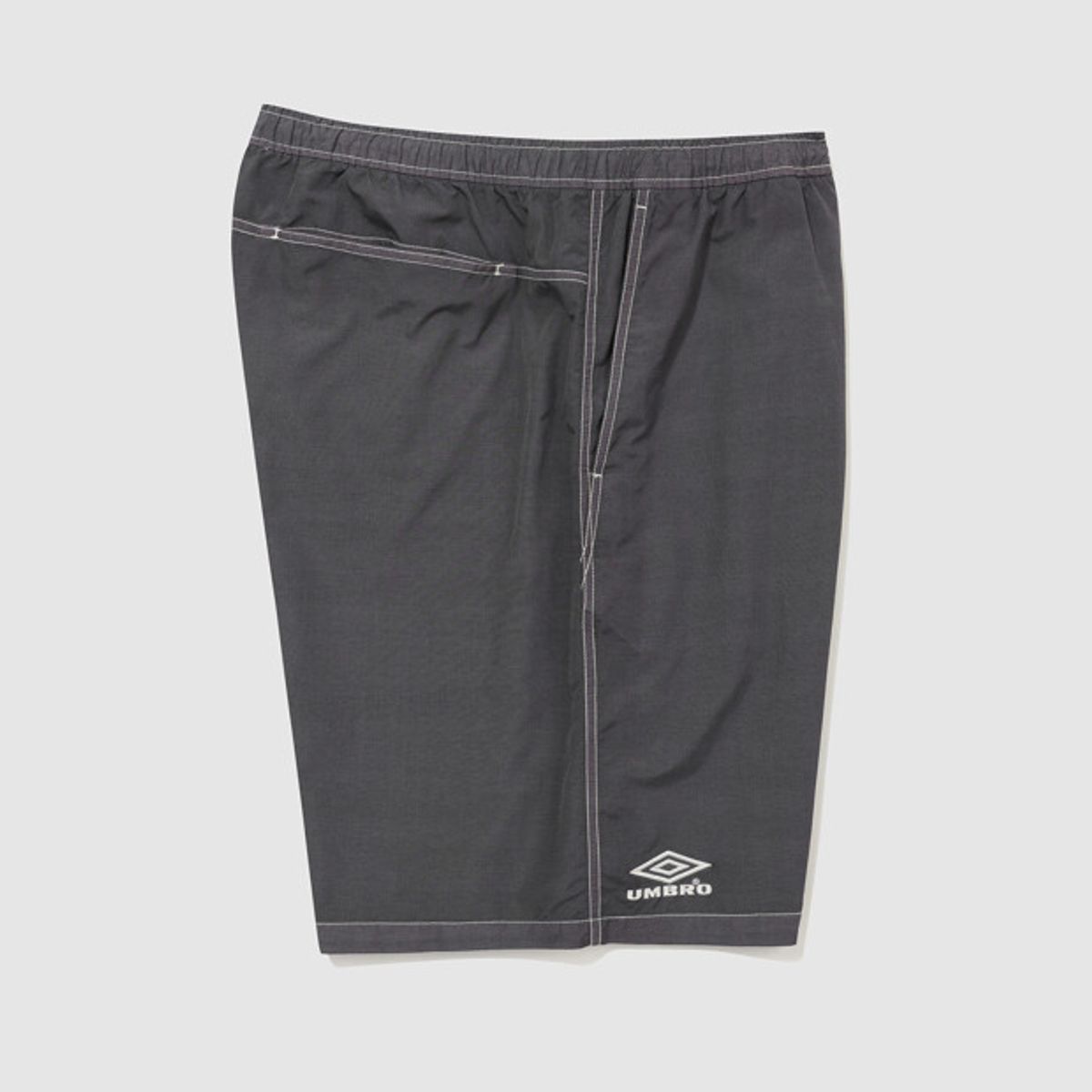 엄브로(UMBRO) 콘크리트 블룸 다잉 우븐 5부 반바지 차콜 UR221CHP57