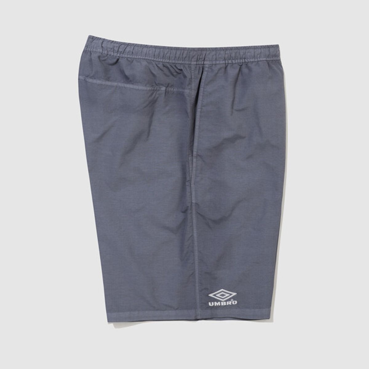 엄브로(UMBRO) 콘크리트 블룸 다잉 우븐 5부 반바지 블루 UR221CHP57