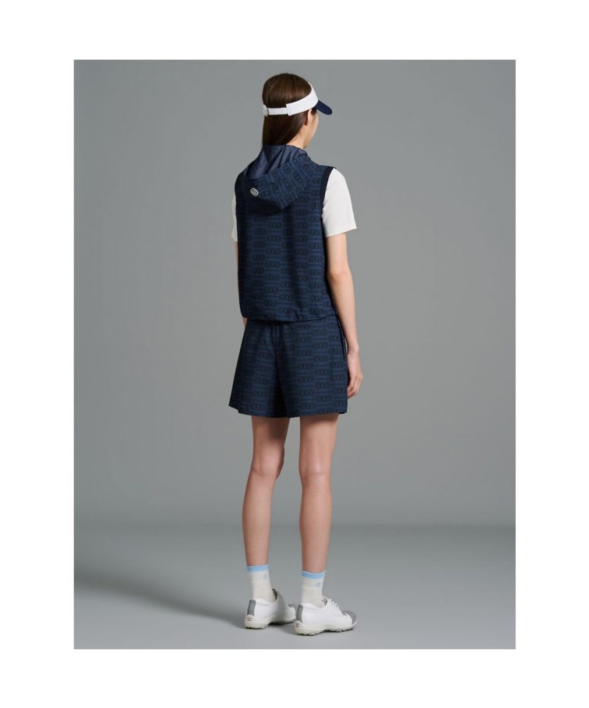 빈폴골프(BEANPOLE GOLF) 여성 변형로고 후디 풀집 베스트 - 네이비