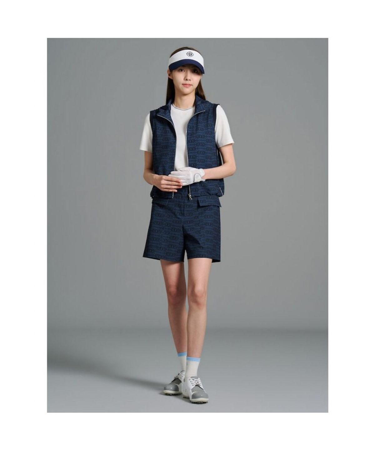 빈폴골프(BEANPOLE GOLF) 여성 변형로고 후디 풀집 베스트 - 네이비