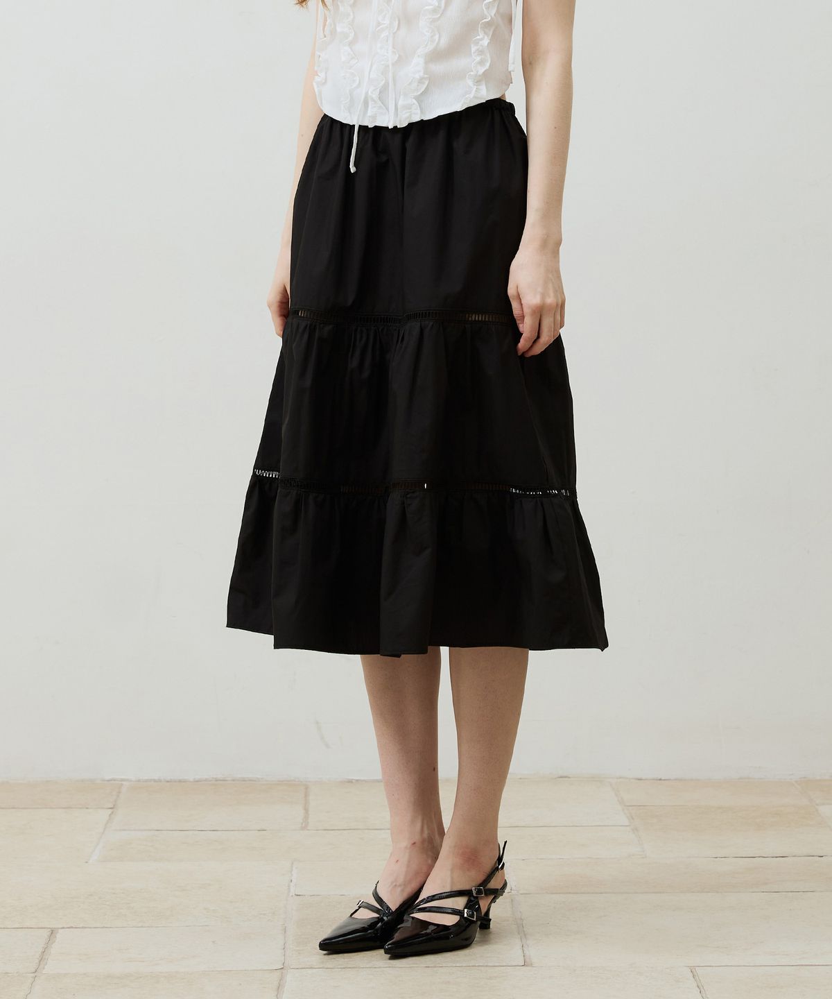 아리킴(ARIKIM) MUSE TIERED MIDI SKIRT / BLACK