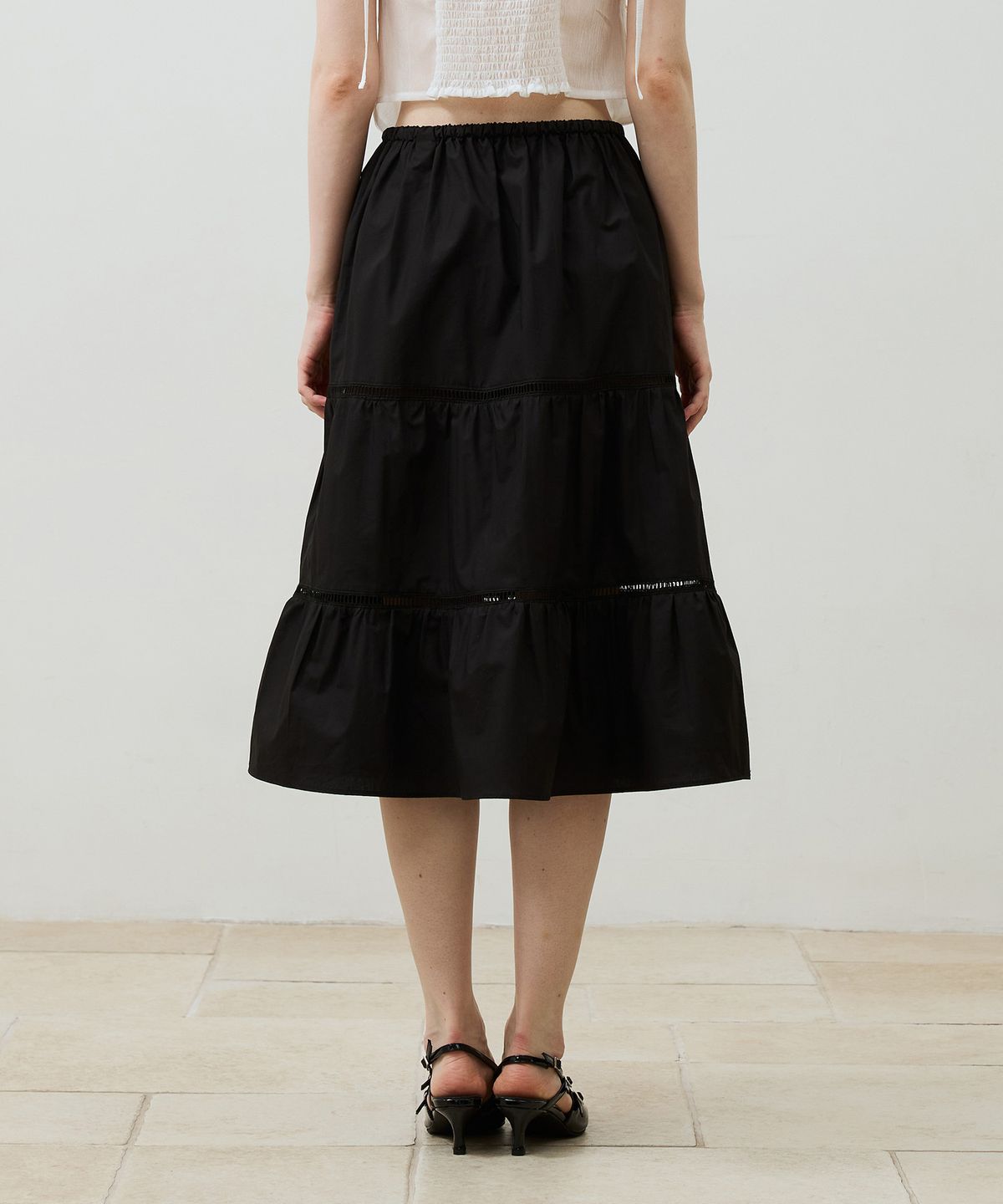 아리킴(ARIKIM) MUSE TIERED MIDI SKIRT / BLACK