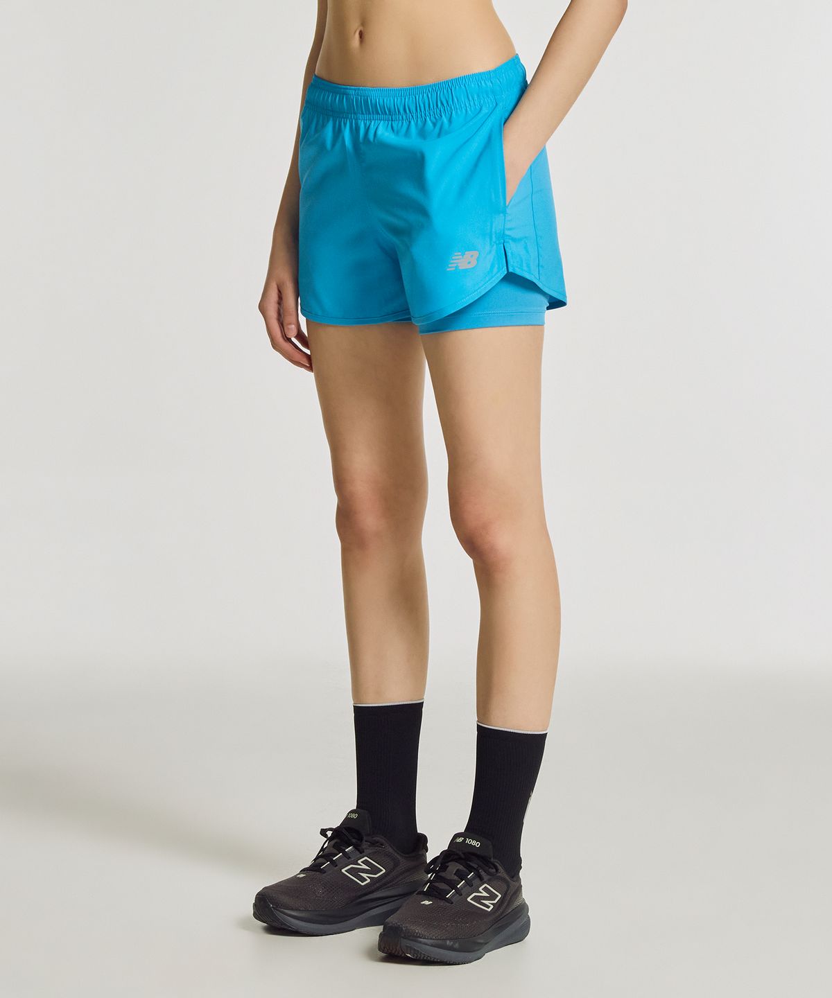 뉴발란스(NEW BALANCE) NBNVG36112 / WOMEN 스포츠에센셜 2in1 쇼츠 3인치 (LIGHT BLUE)