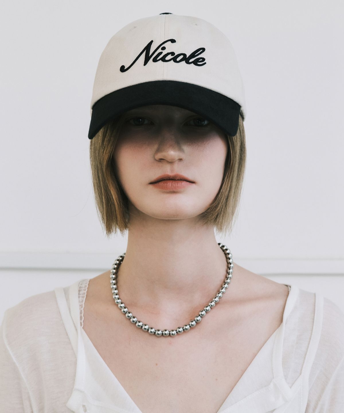 닉앤니콜(NICK&NICOLE) NICOLE LETTERING BALL CAP_TWOTONE BLACK