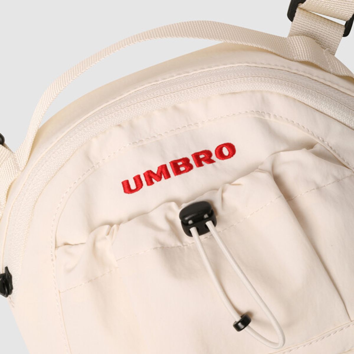 엄브로(UMBRO) 우먼스 만두 크로스백 아이보리 UR222CBG62