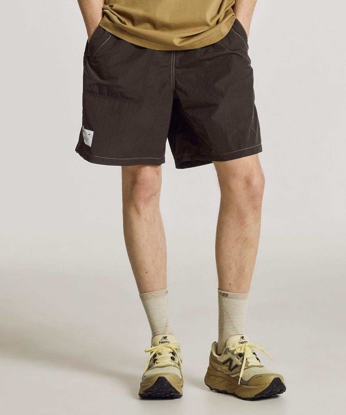 뉴발란스(NEW BALANCE) NBNVF31743 / UNI Ndurance 4.5부 우븐 쇼츠 (D/BROWN)