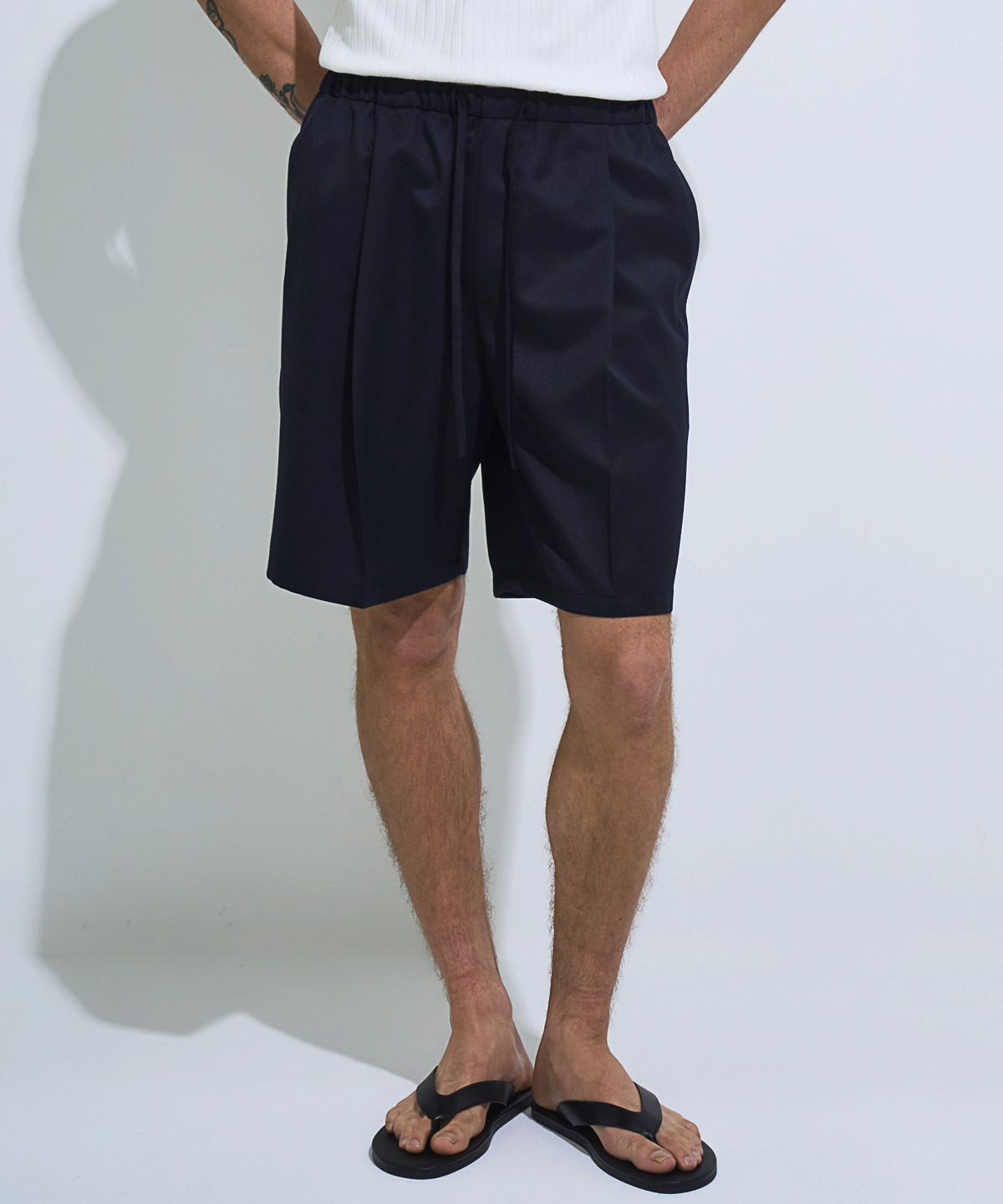 페크(PEQ) WOOL PLEATED SHORTS (NAVY)
