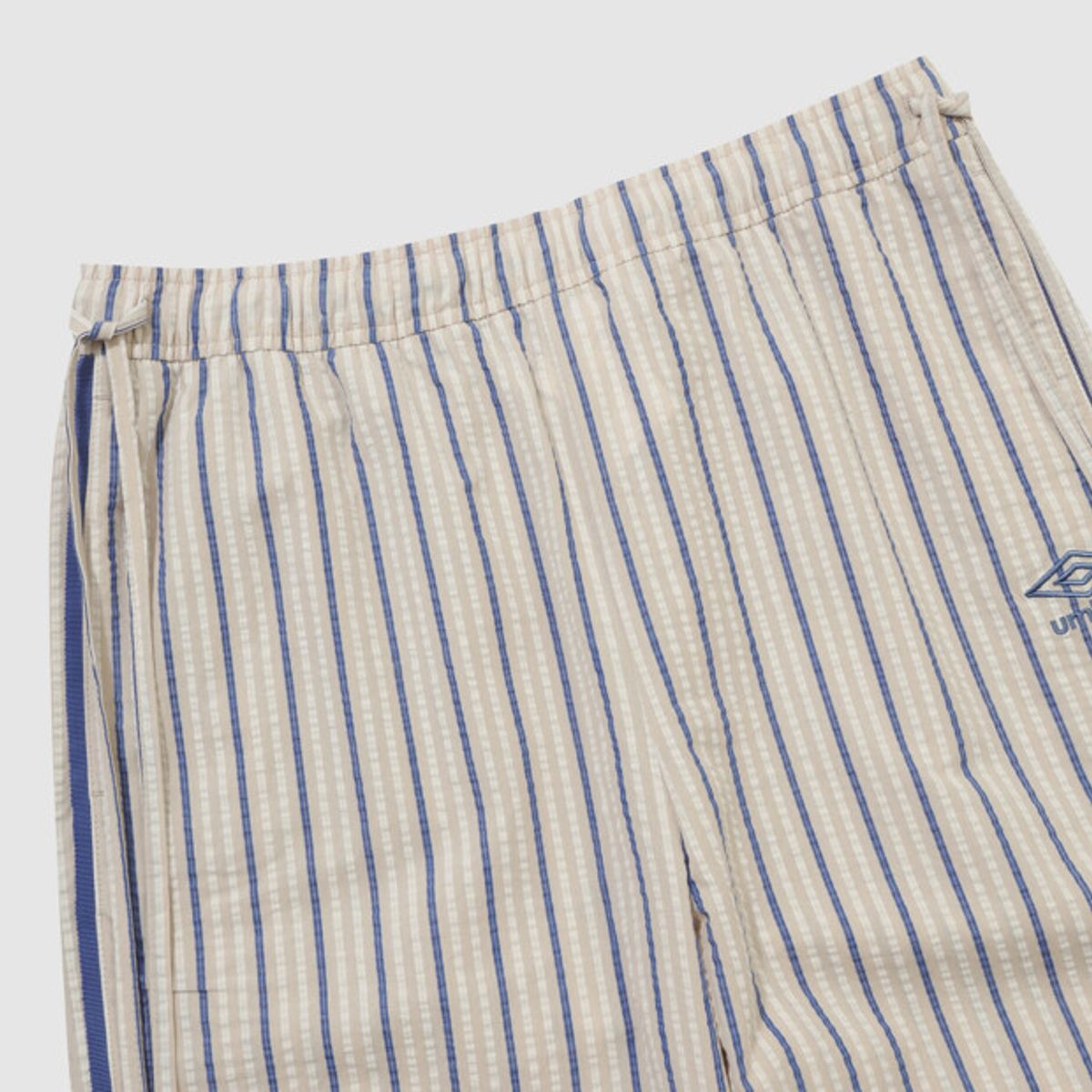 엄브로(UMBRO) 코지코어 우먼스 시어서커 패턴 와이드 팬츠 베이지 UR222CPT68
