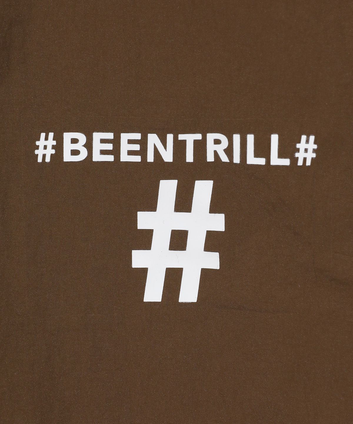 빈트릴(BEENTRILL) 에센셜 스몰 로고 우븐 스커트(브라운)