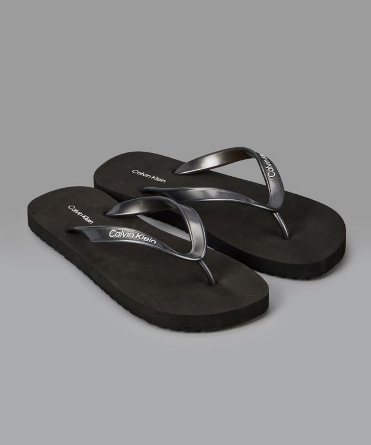 캘빈클라인 진(CALVIN KLEIN JEANS) 여성 에르와 TPU 메탈릭 플립플랍 HW02956 0GJ