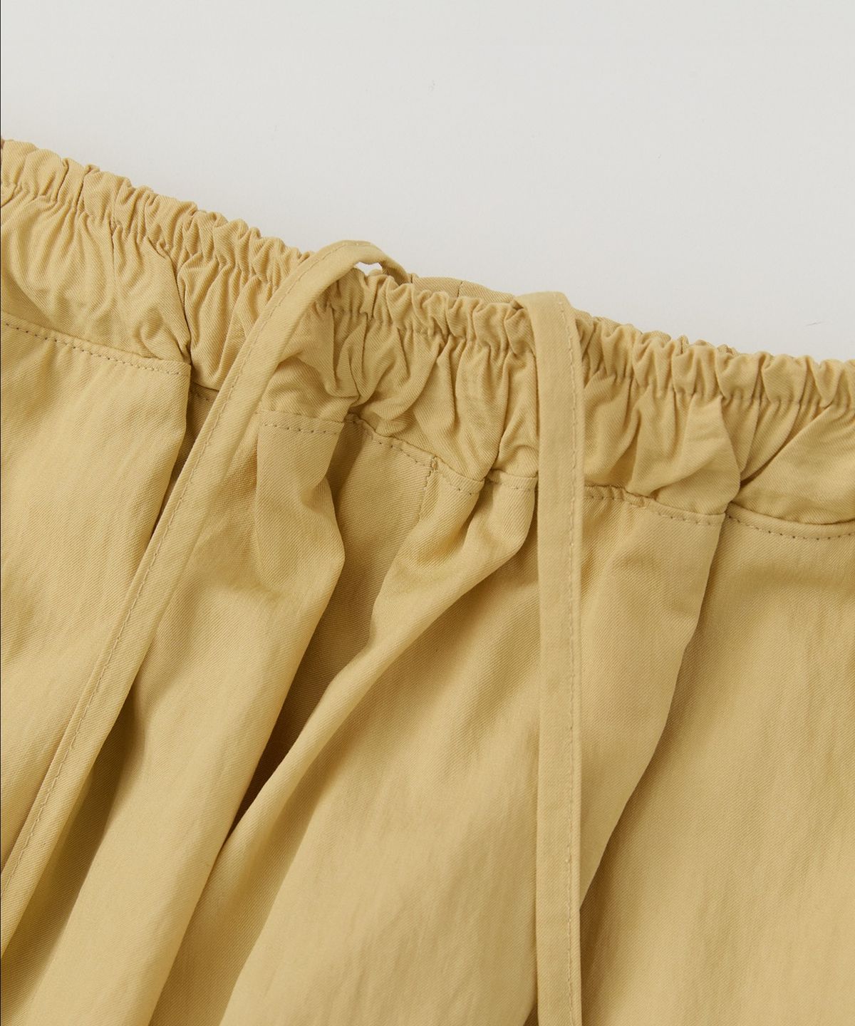 로우넬라인(LOW NELLINE) MAC CURVED MESH NYLON PANTS_YELLOW