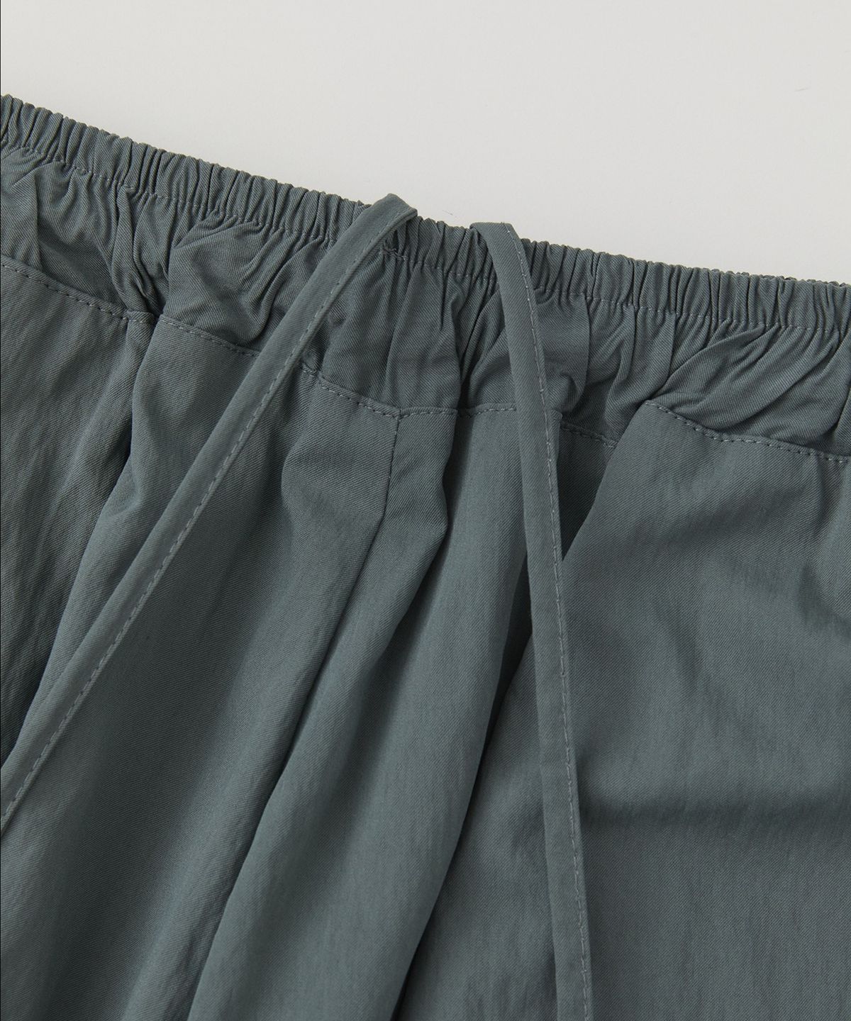 로우넬라인(LOW NELLINE) MAC CURVED MESH NYLON PANTS_CHARCOAL
