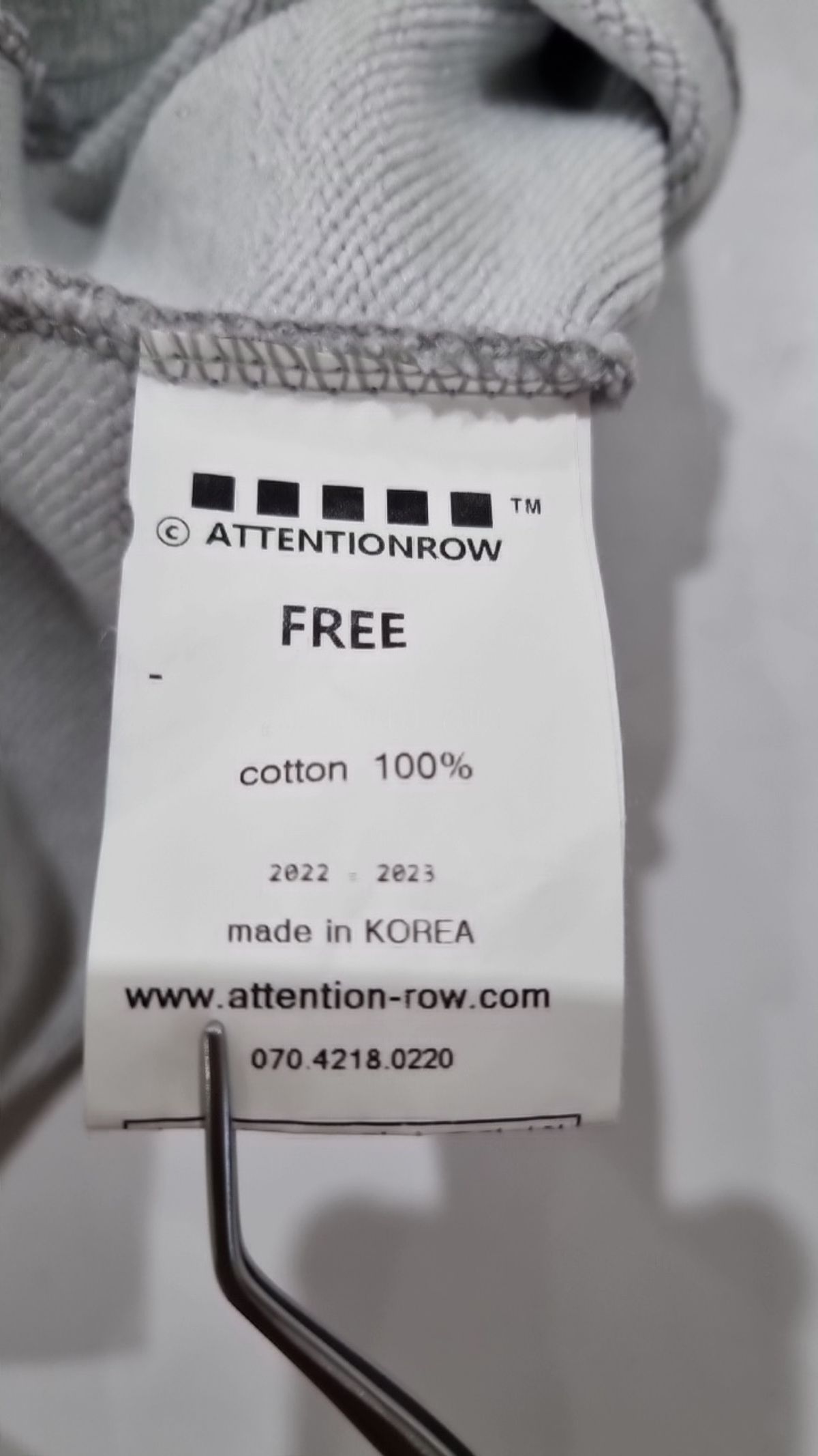 어텐션로우(ATTENTIONROW) 후드 티셔츠 FREE