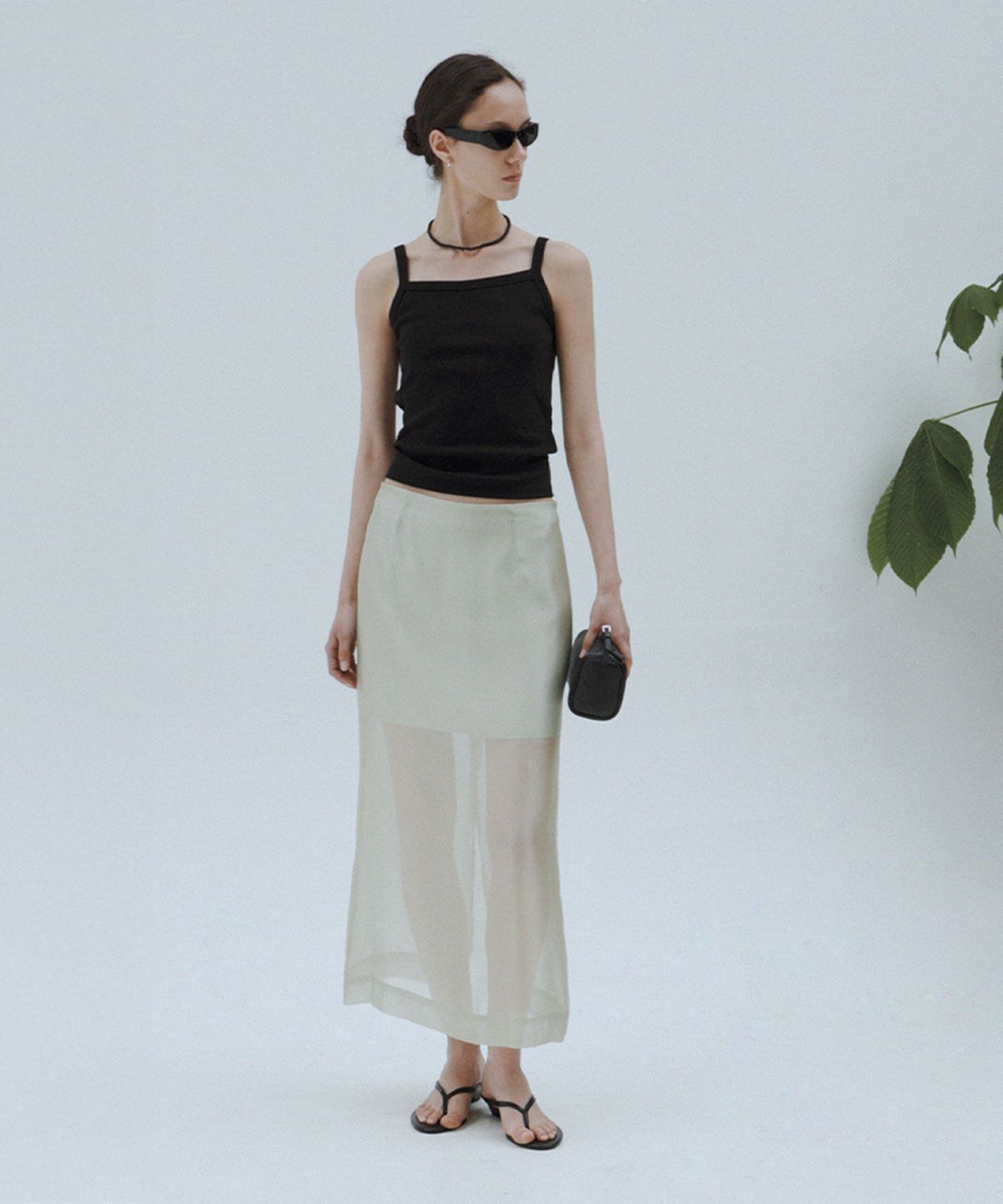 퀸스래빗(Q'SRB) Sheer Glossy Mid-Length Skirt