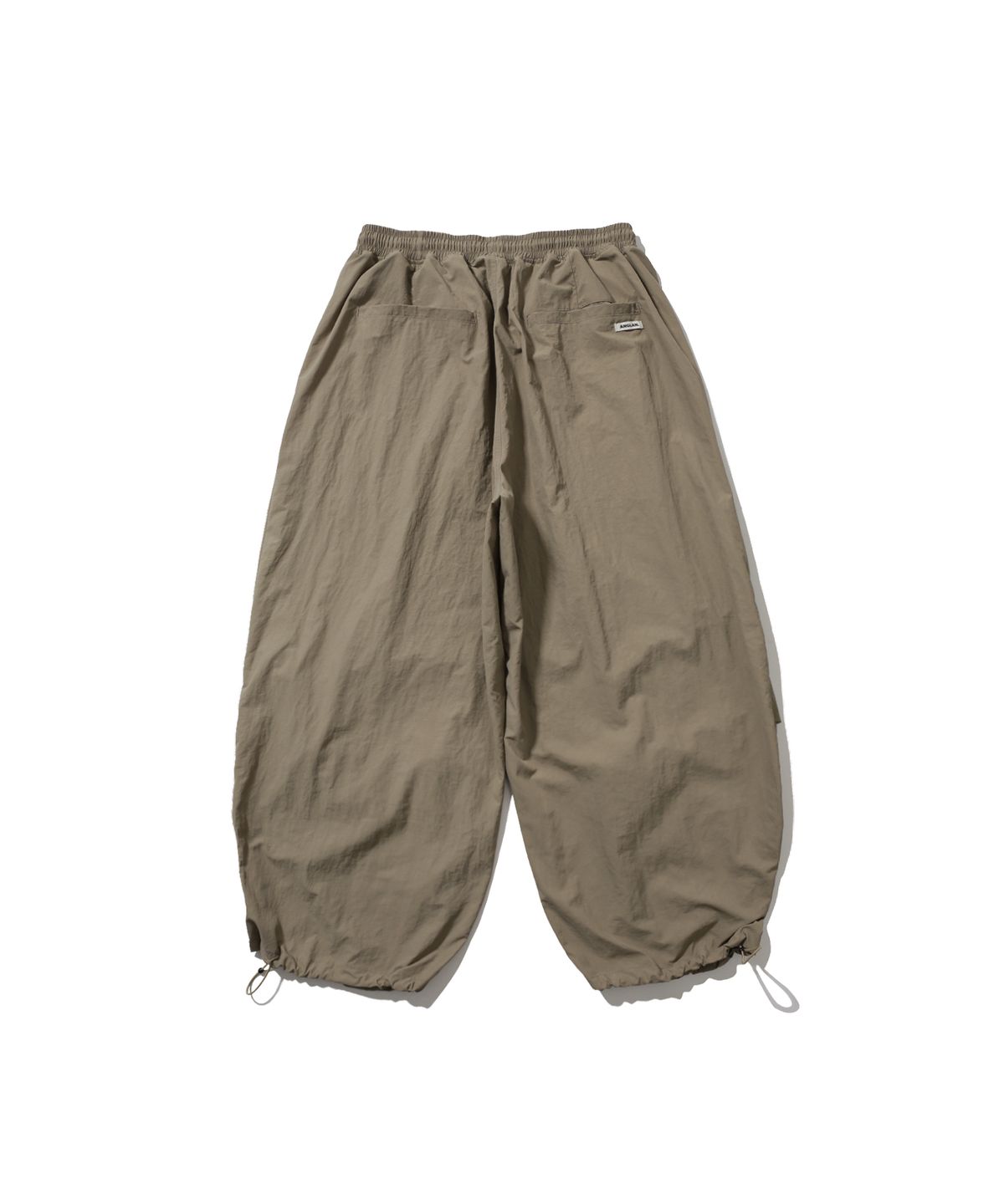 앵글런(ANGLAN) Nylon Parachute Balloon Pants - Beige