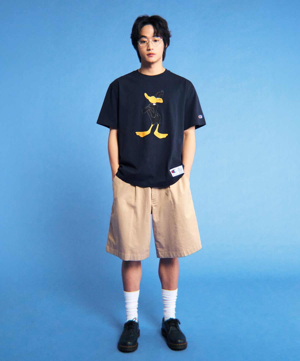 챔피온(CHAMPION) 챔피온 X 루니툰즈 반팔 티셔츠 대피 덕 Navy