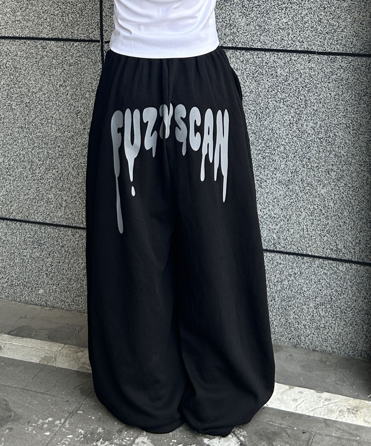 퍼지스캔(FUZZY SCAN) 아치 로고 커브드 벌룬팬츠 멜란지
