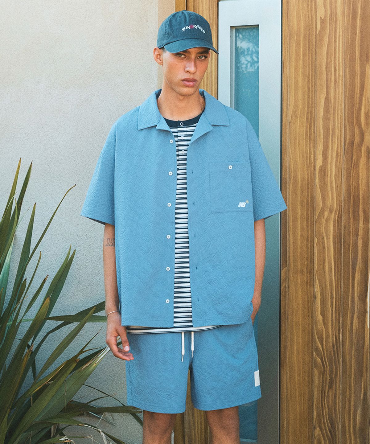뉴발란스(NEW BALANCE) NBNAGCA013 / UNI 선 키스드 반팔셔츠 (INDIGO)