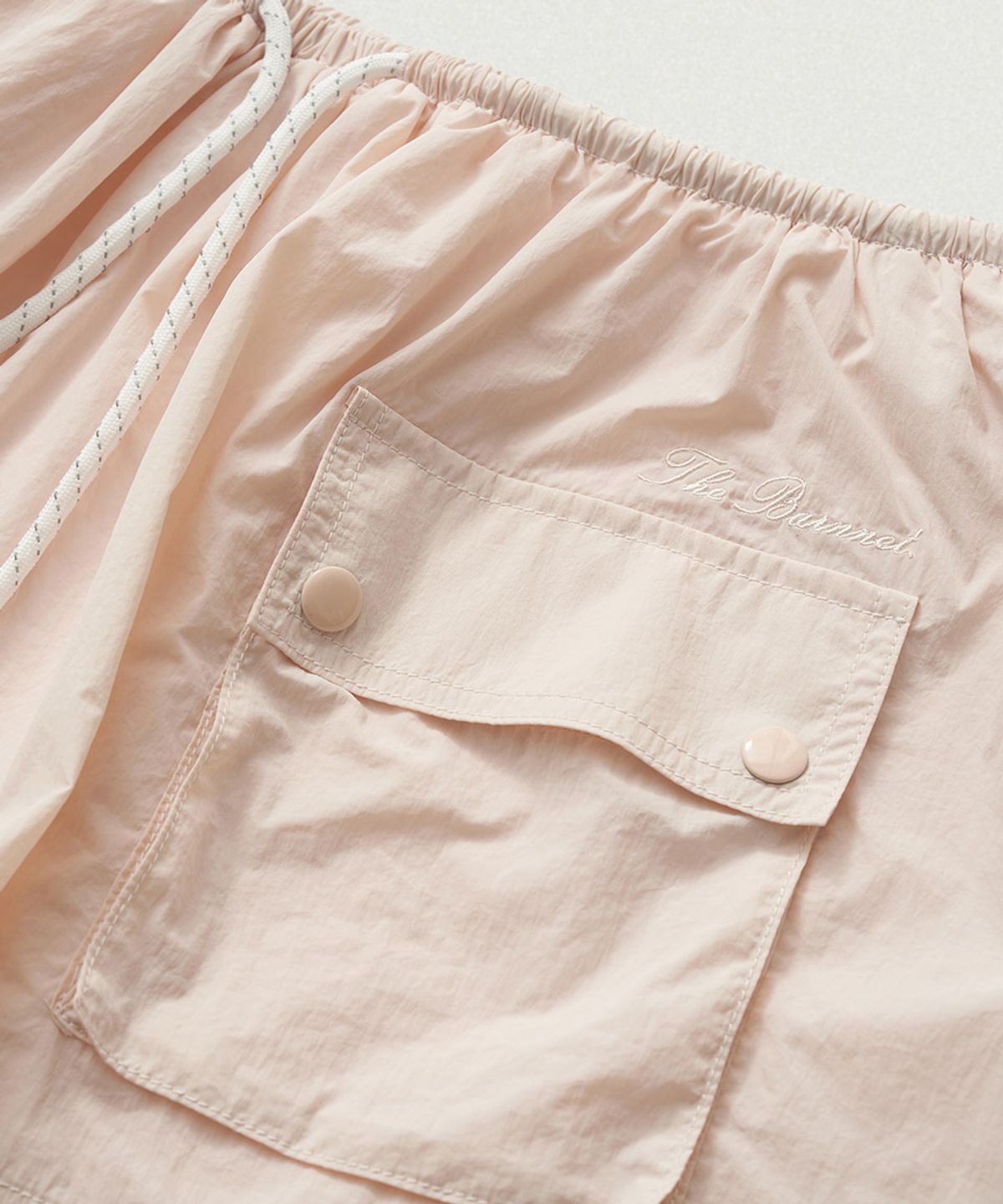 더바넷(THEBARNNET) Leon Wind Drawstring Skirt_Pink