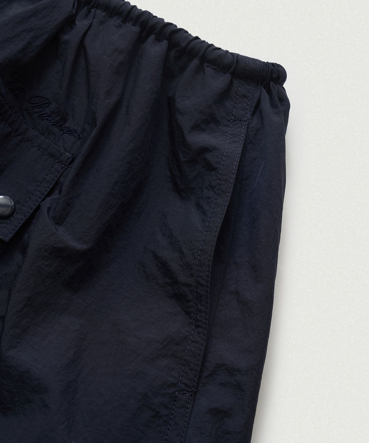 더바넷(THEBARNNET) Leon Wind Drawstring Skirt_Navy