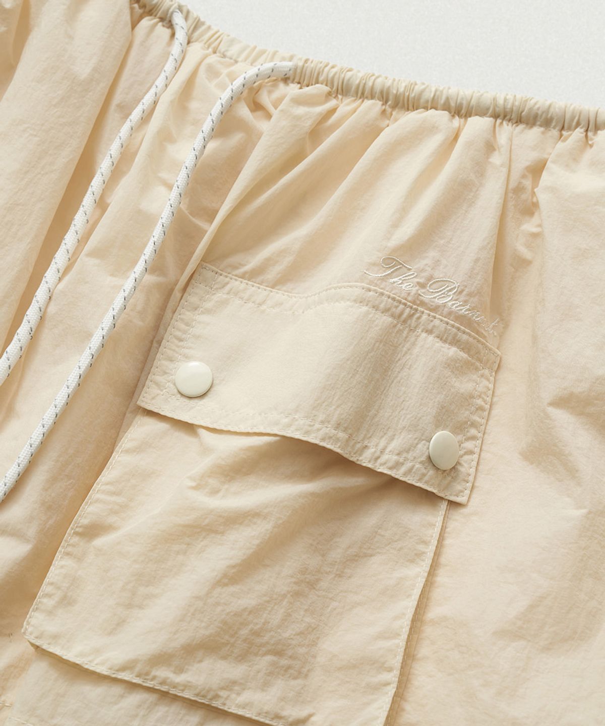 더바넷(THEBARNNET) Leon Wind Drawstring Skirt_Yellow