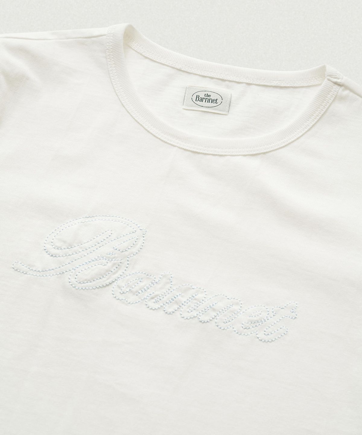 더바넷(THEBARNNET) Diana Chain Stitch Logo T-Shirt_White